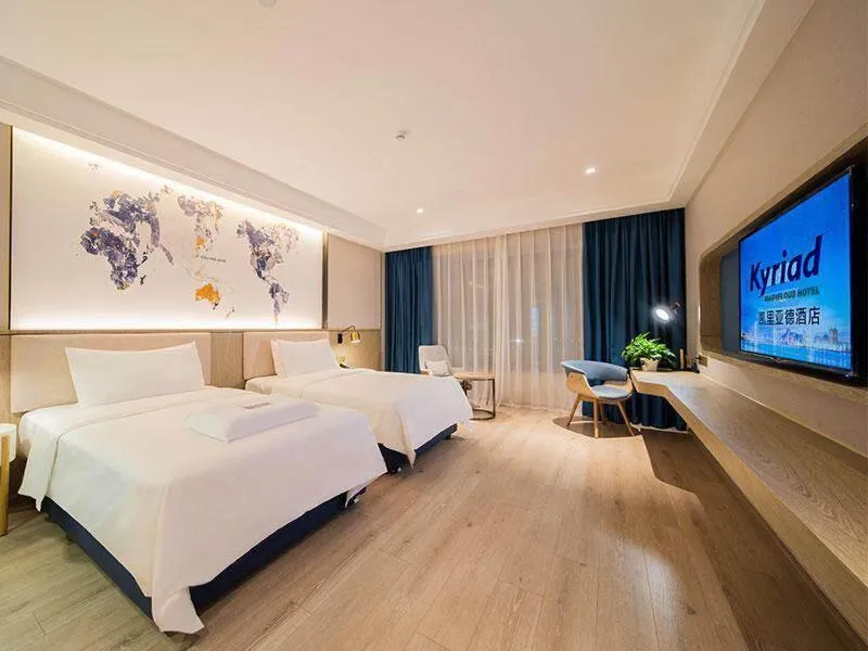 Bed in Kyriad Marvelous Hotel Heyuan Hakka Culture Park