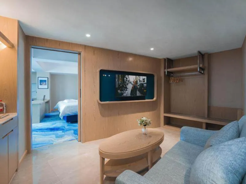 Bed in Kyriad Marvelous Hotel Shenzhen Guangming Zhenmei Subway Station