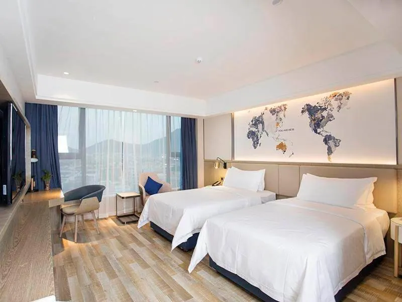 Bed in Kyriad Marvelous Hotel Foshan Xiqiao Mountain Scenic Area Qiaoling Square