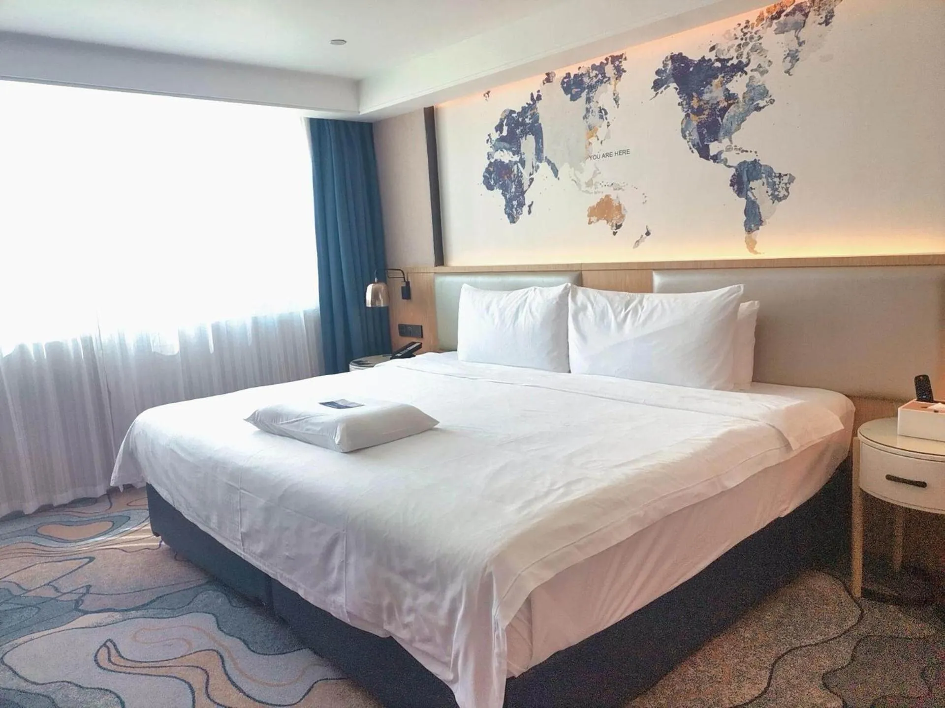 Bed in Kyriad Hotel Zhongshan University of Science and Technology