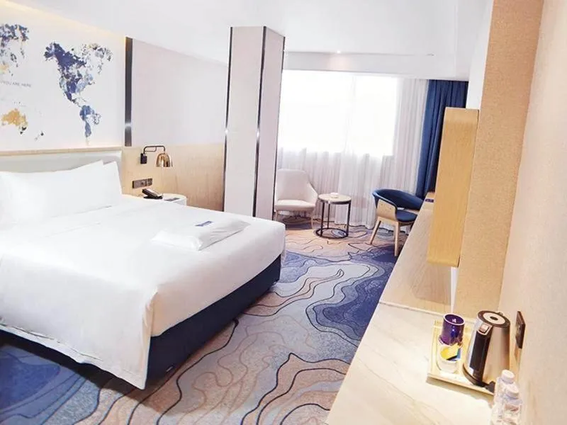 Bed in Kyriad Hotel Zhongshan University of Science and Technology