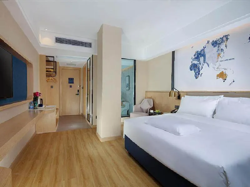 Bed in Kyriad Marvelous Hotel Zhongshan West District