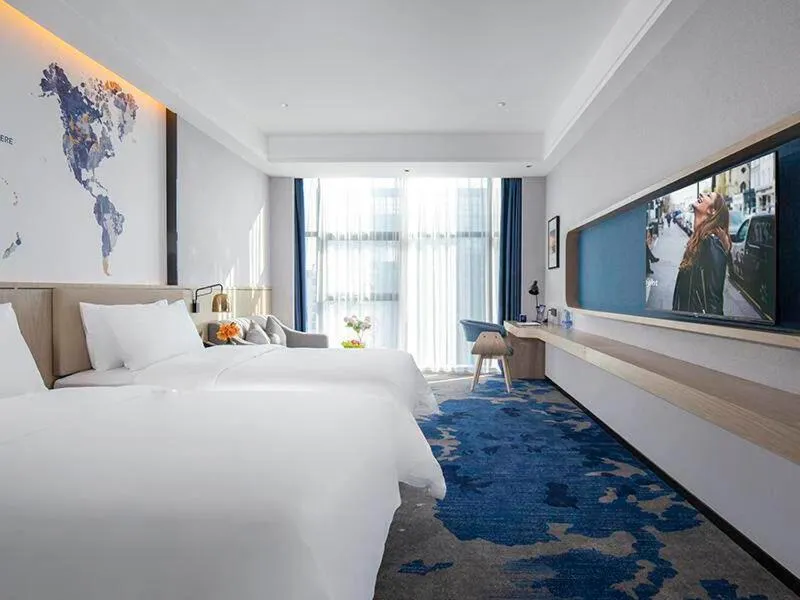 Bed in Kyriad Marvelous Hotel Fangchenggang Administration Center High-Speed Railway Station