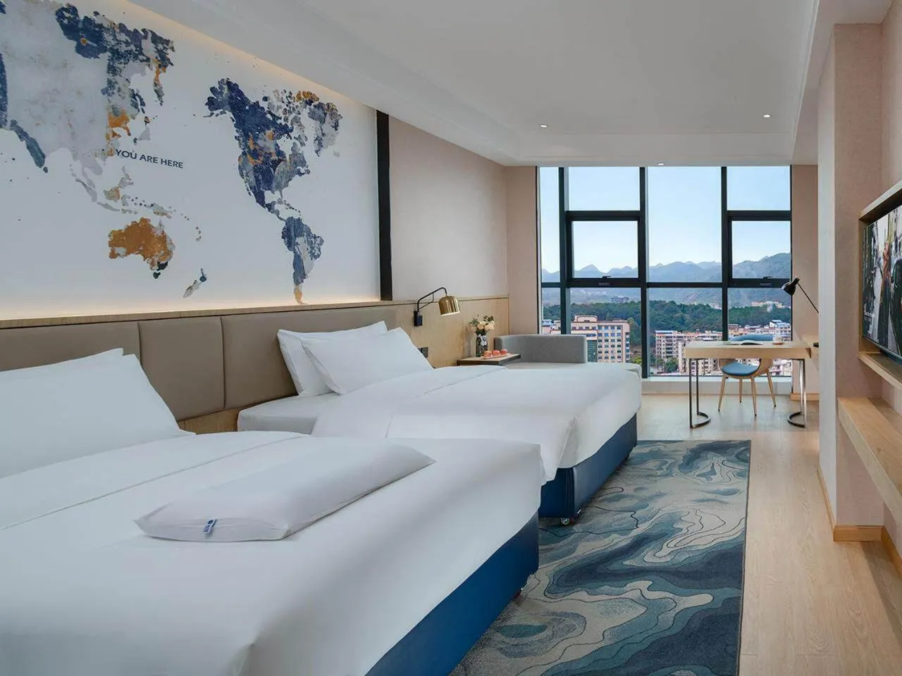 Bed in Kyriad Marvelous Hotel Guilin Quanzhou