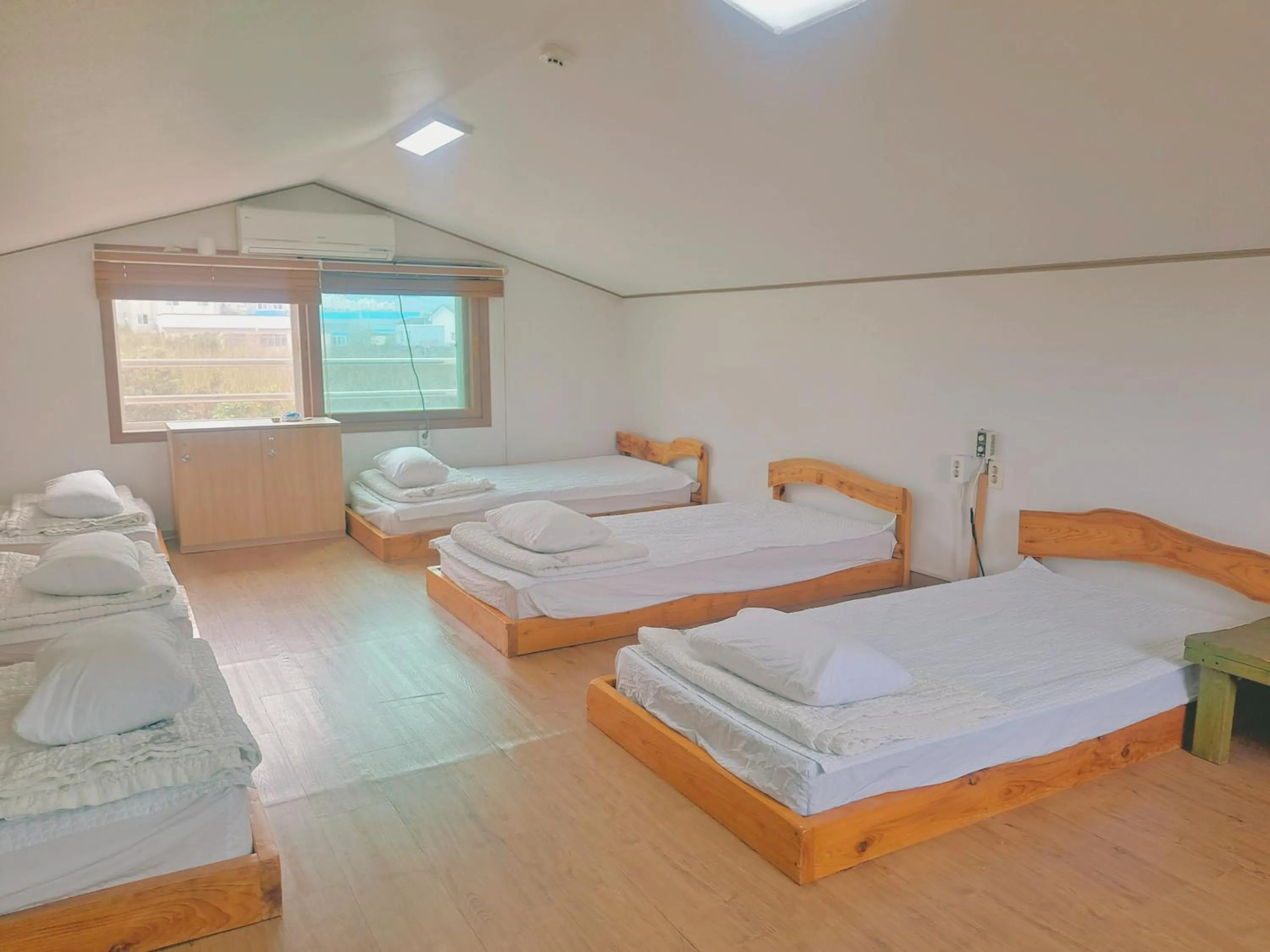 Bed in Jeju Gillime Pension