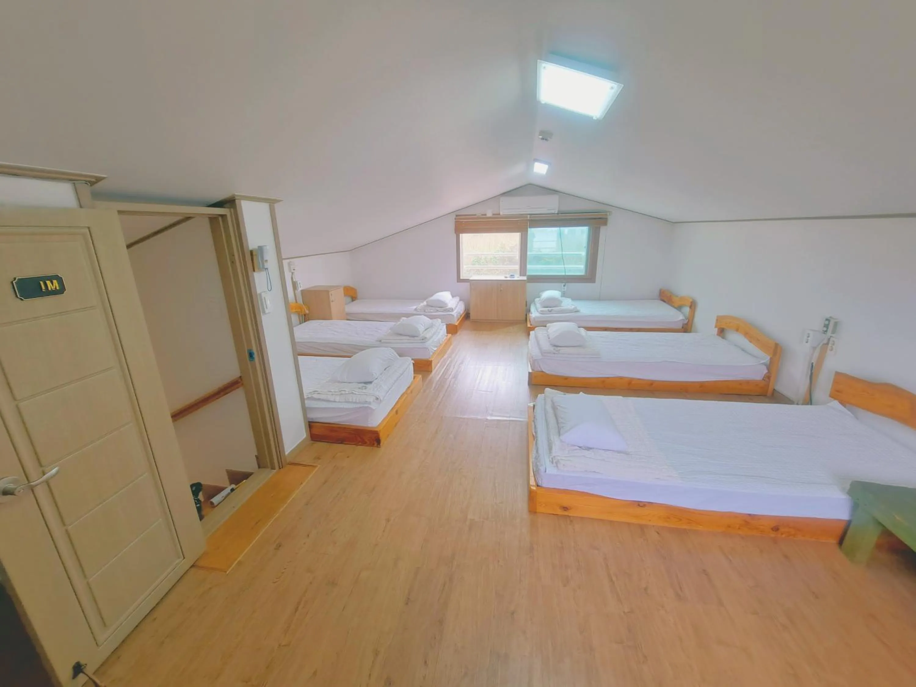 Bed in Jeju Gillime Pension