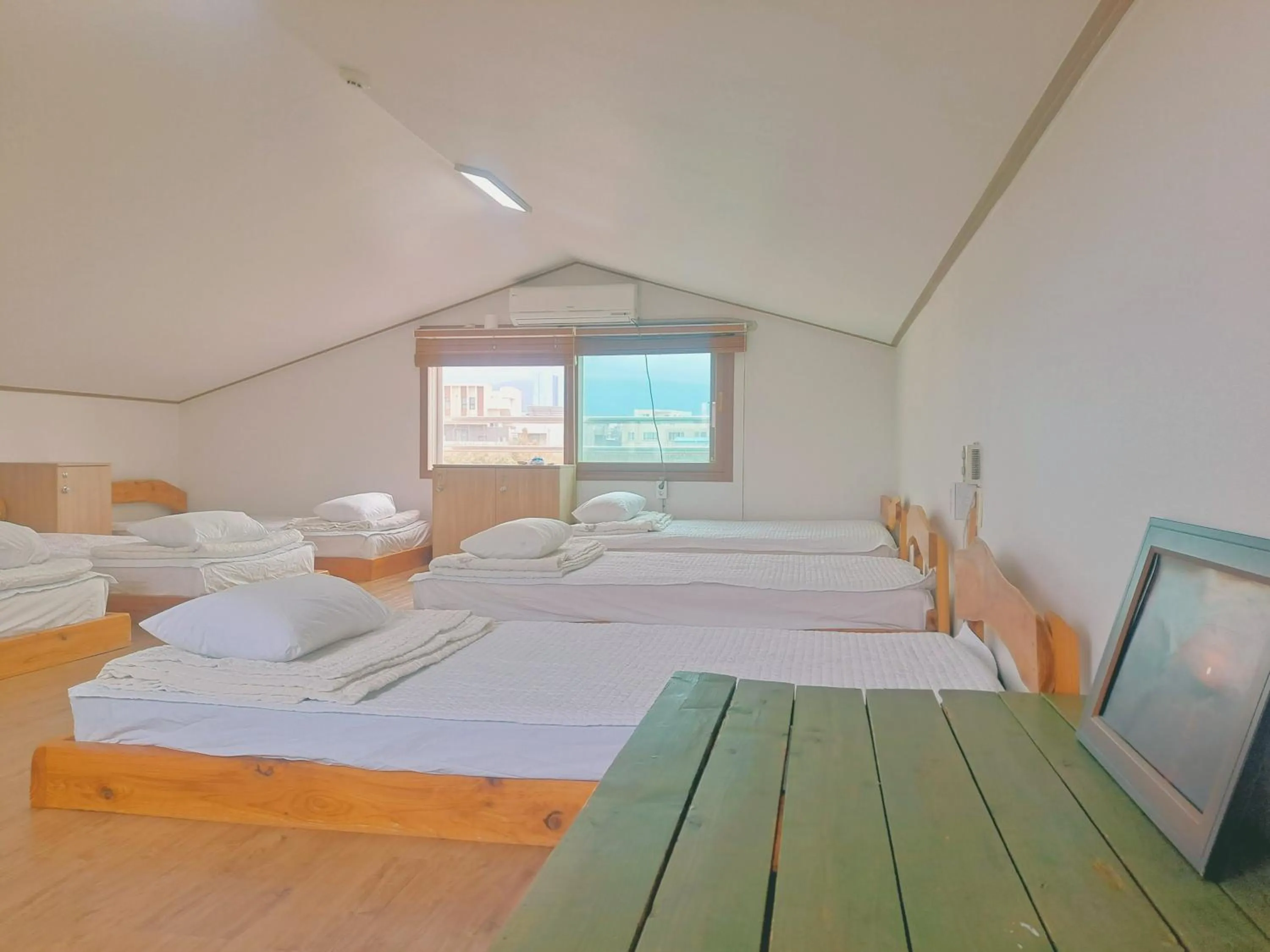 Bed in Jeju Gillime Pension