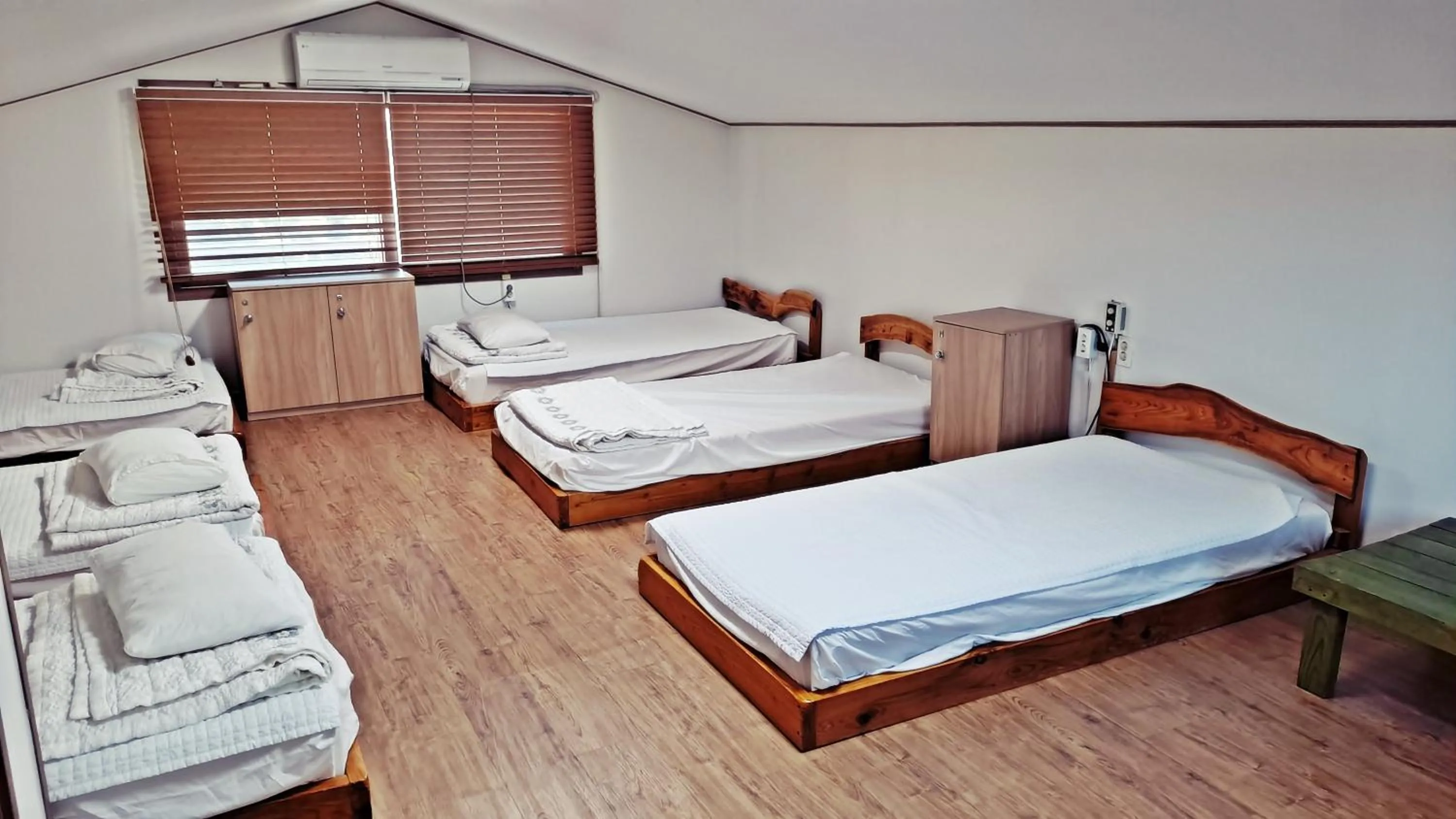 Bed in Jeju Gillime Pension