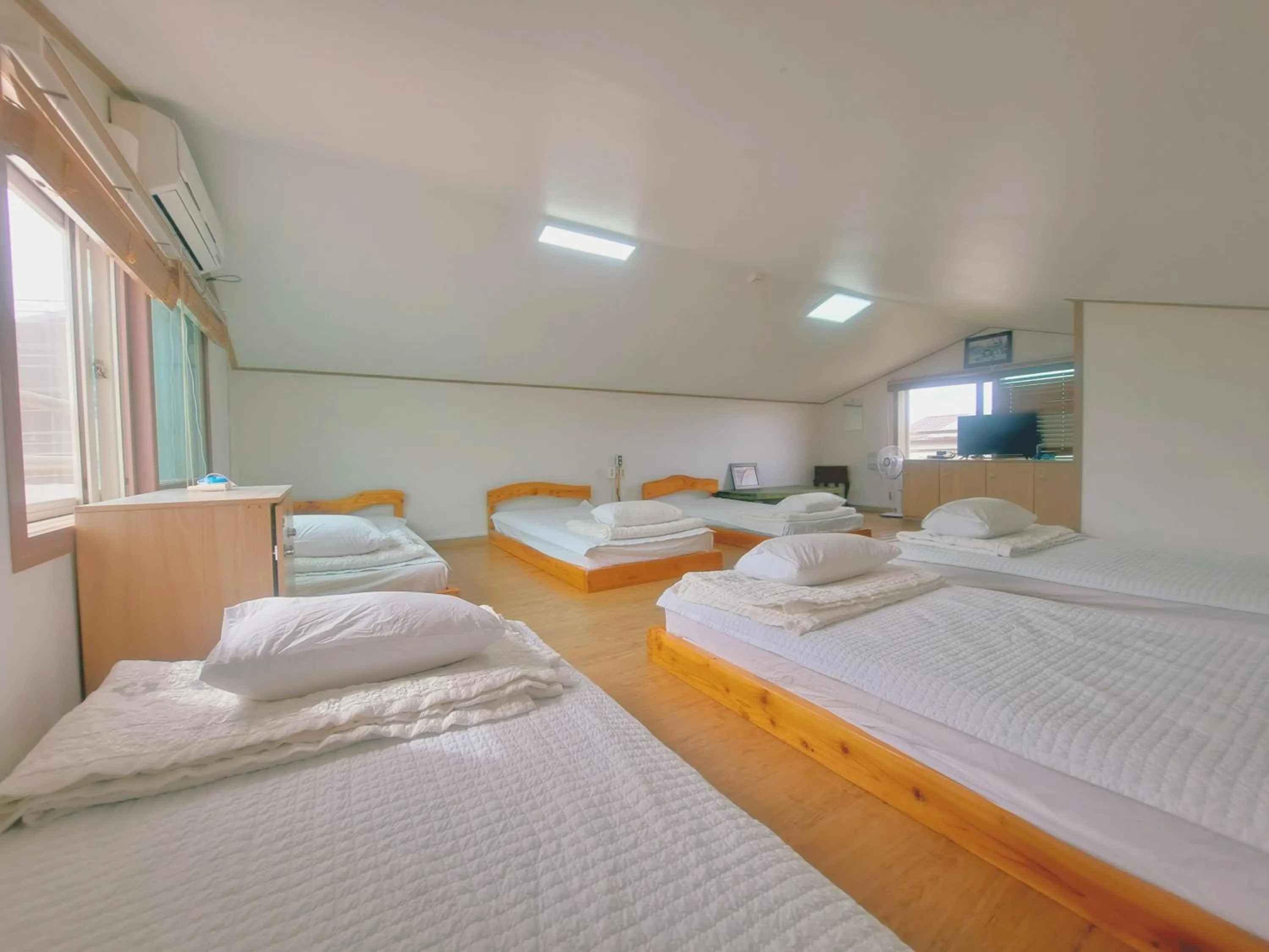 Bed in Jeju Gillime Pension