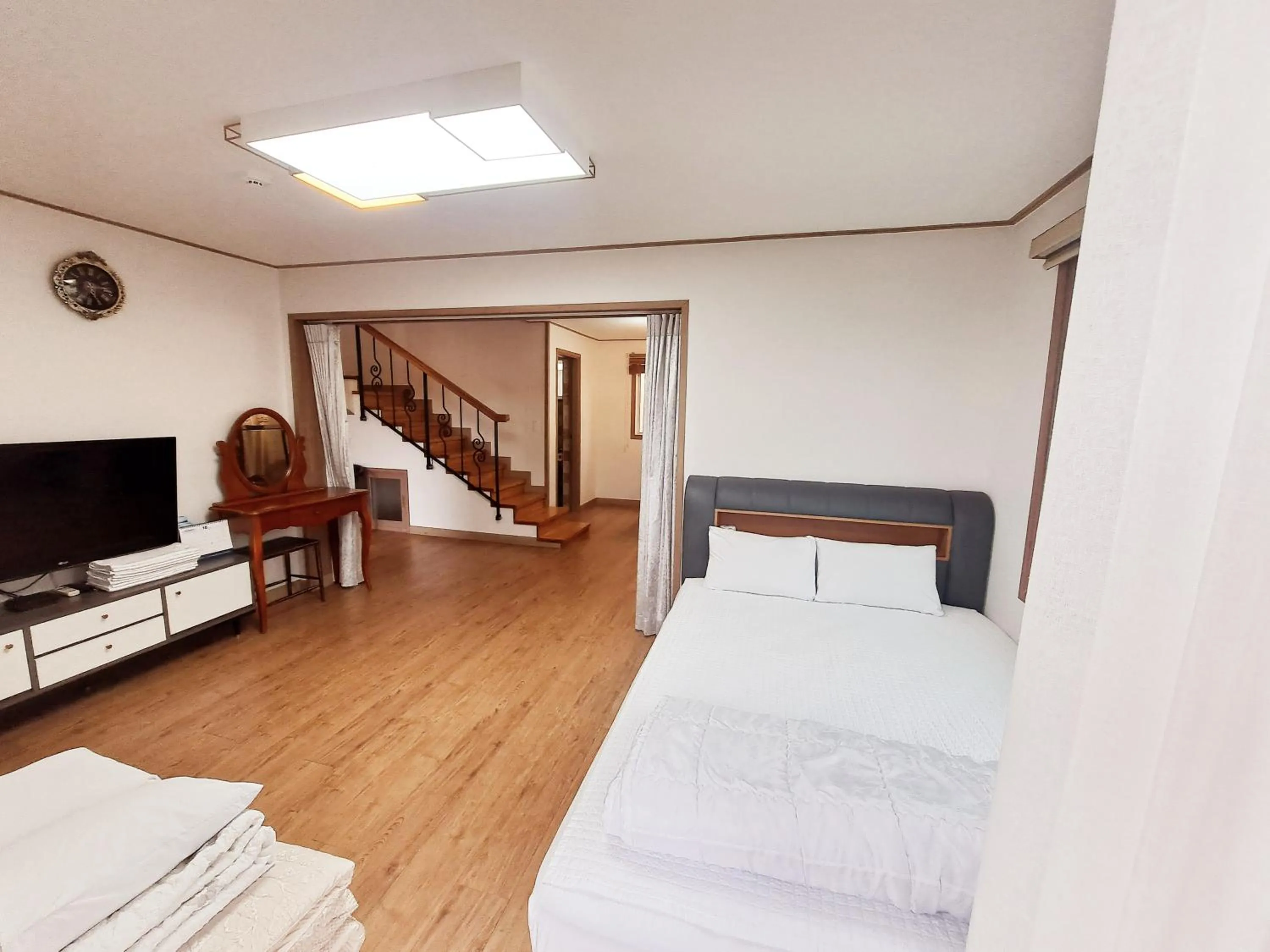 Bed in Jeju Gillime Pension