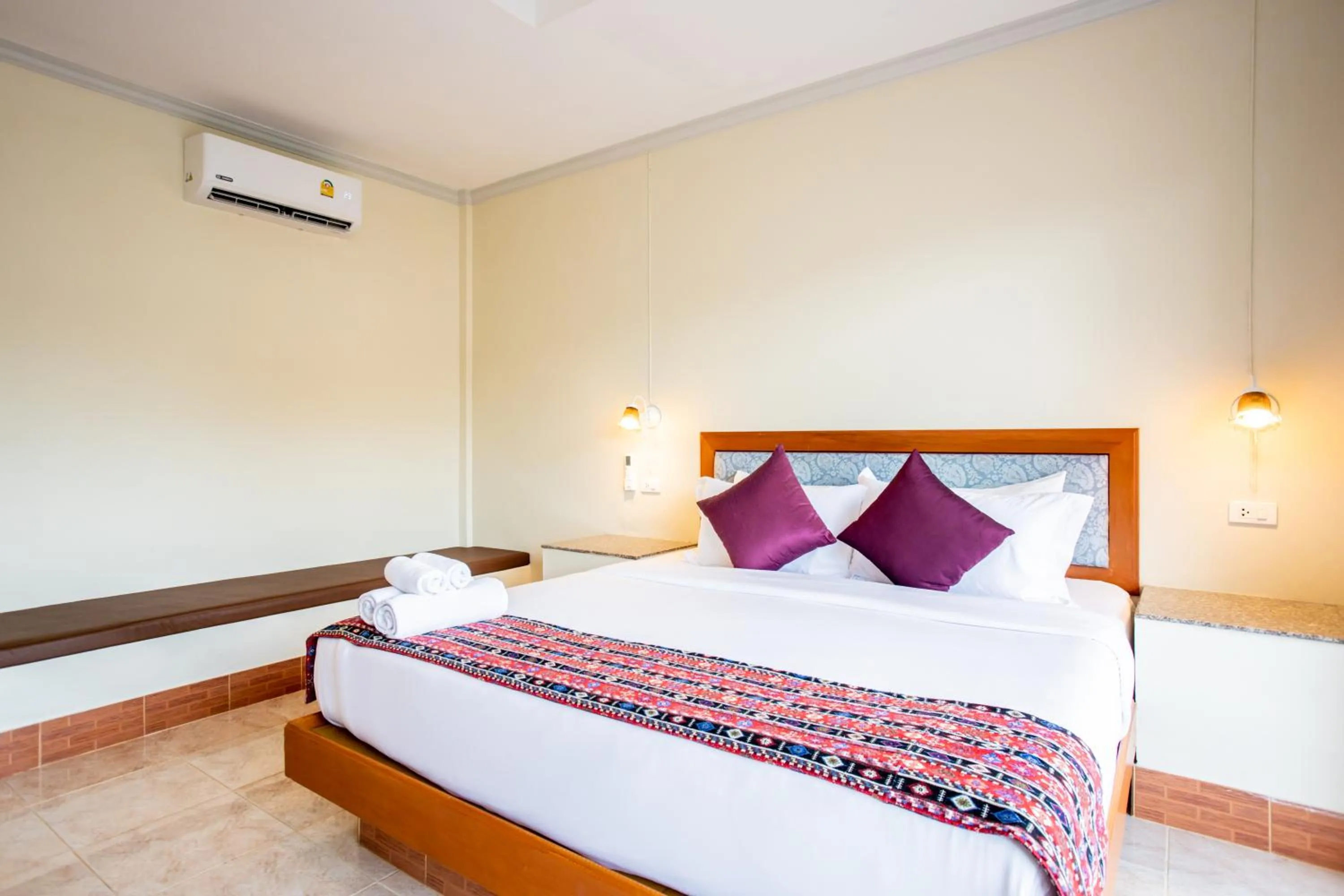 Bed in Tri's Miracle Kata Beach Side