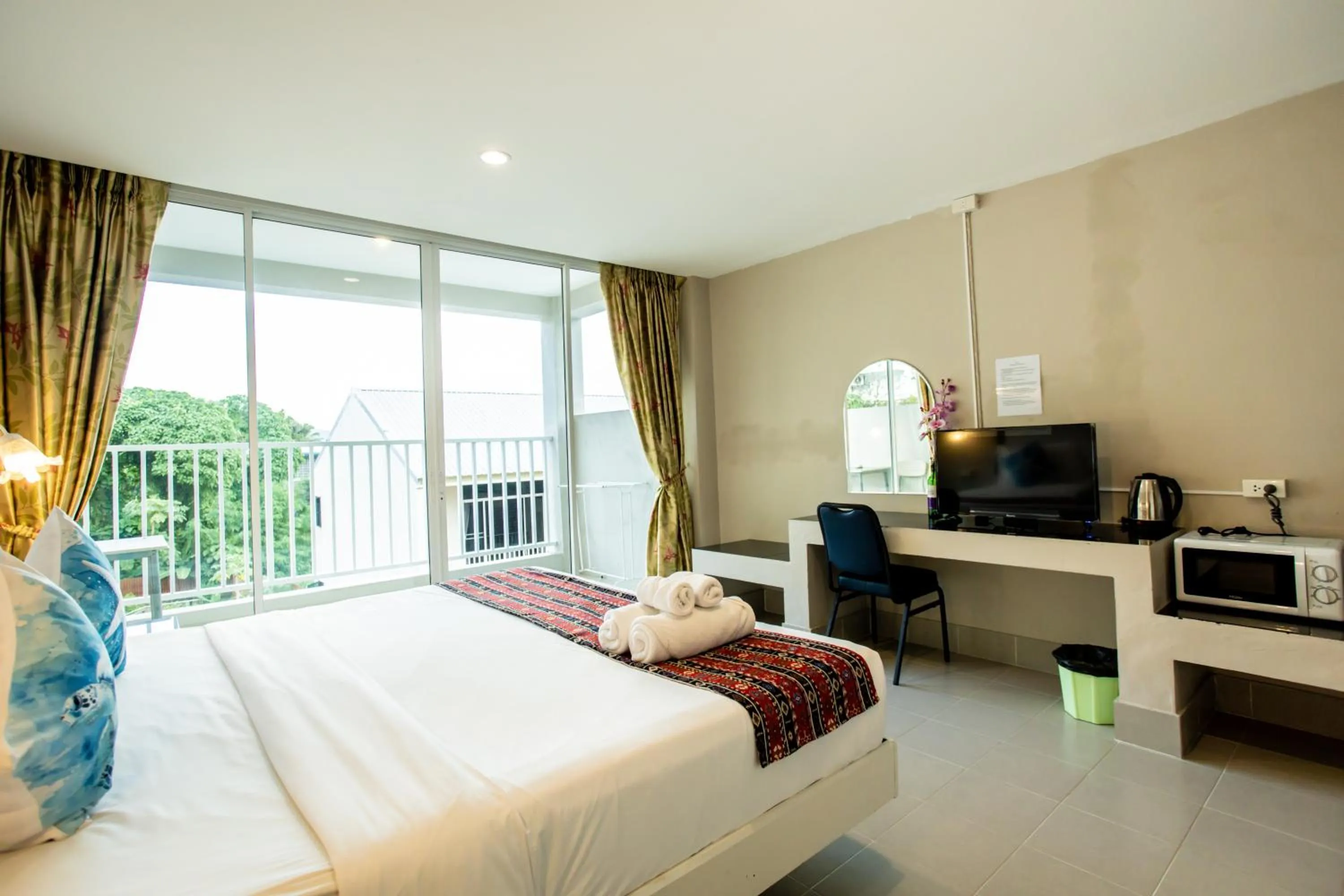 Bed in Tri's Miracle Kata Beach Side