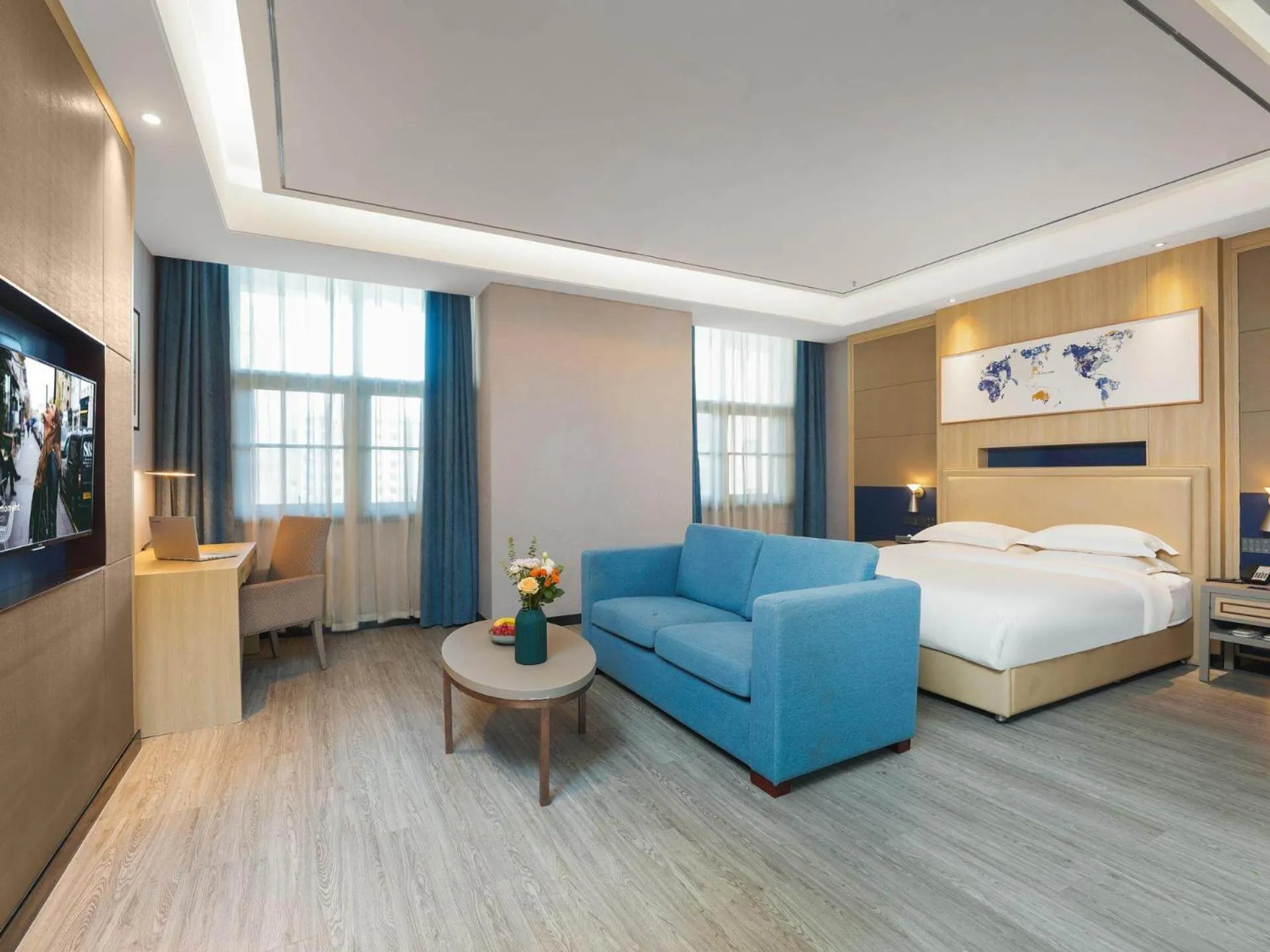 Bed in Kyriad Hotel Baoying Jinyuan Square High-speed Railway Station