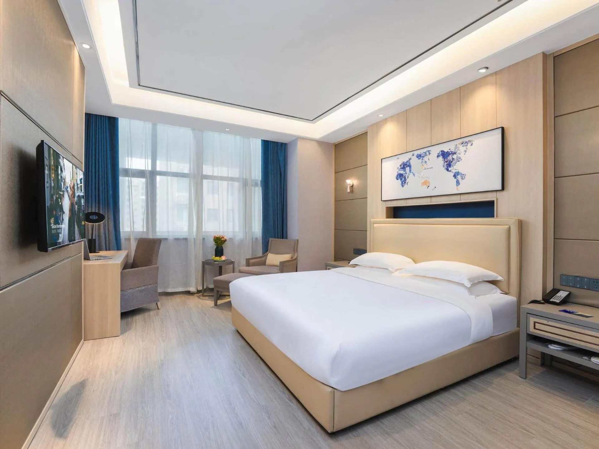 Bed in Kyriad Hotel Baoying Jinyuan Square High-speed Railway Station