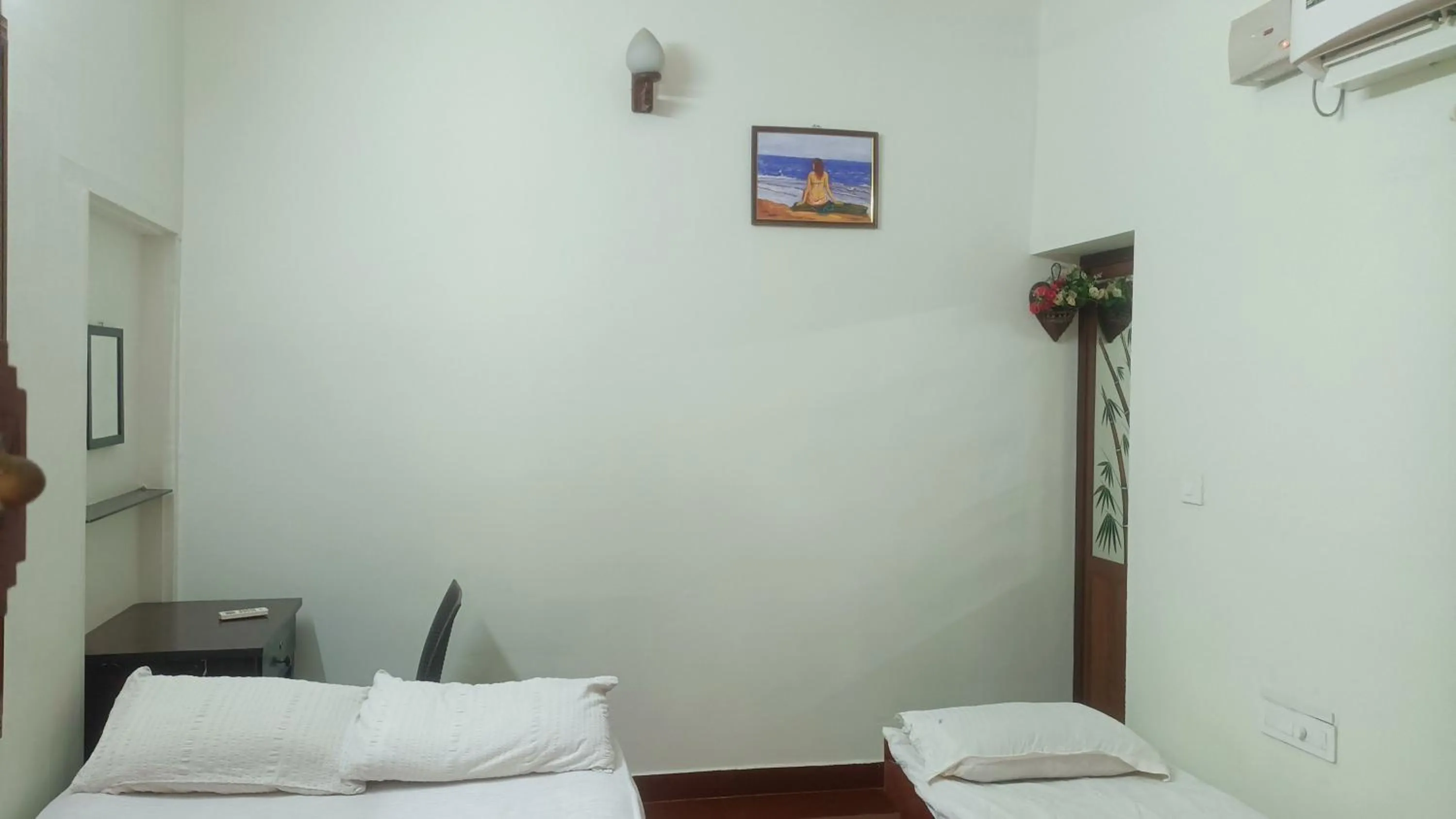 Bed in Angels' homestay Marari