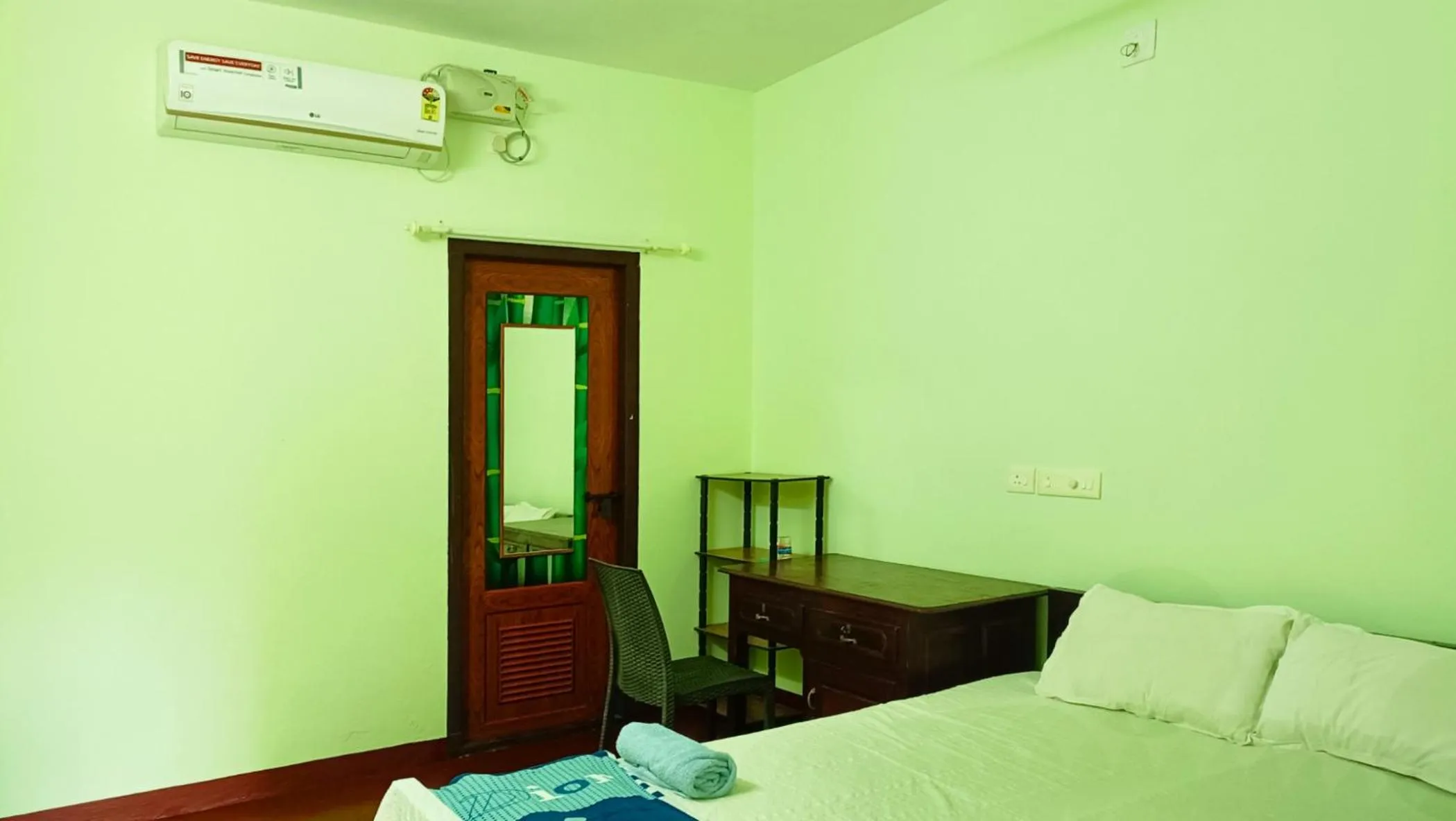 Bed in Angels' homestay Marari