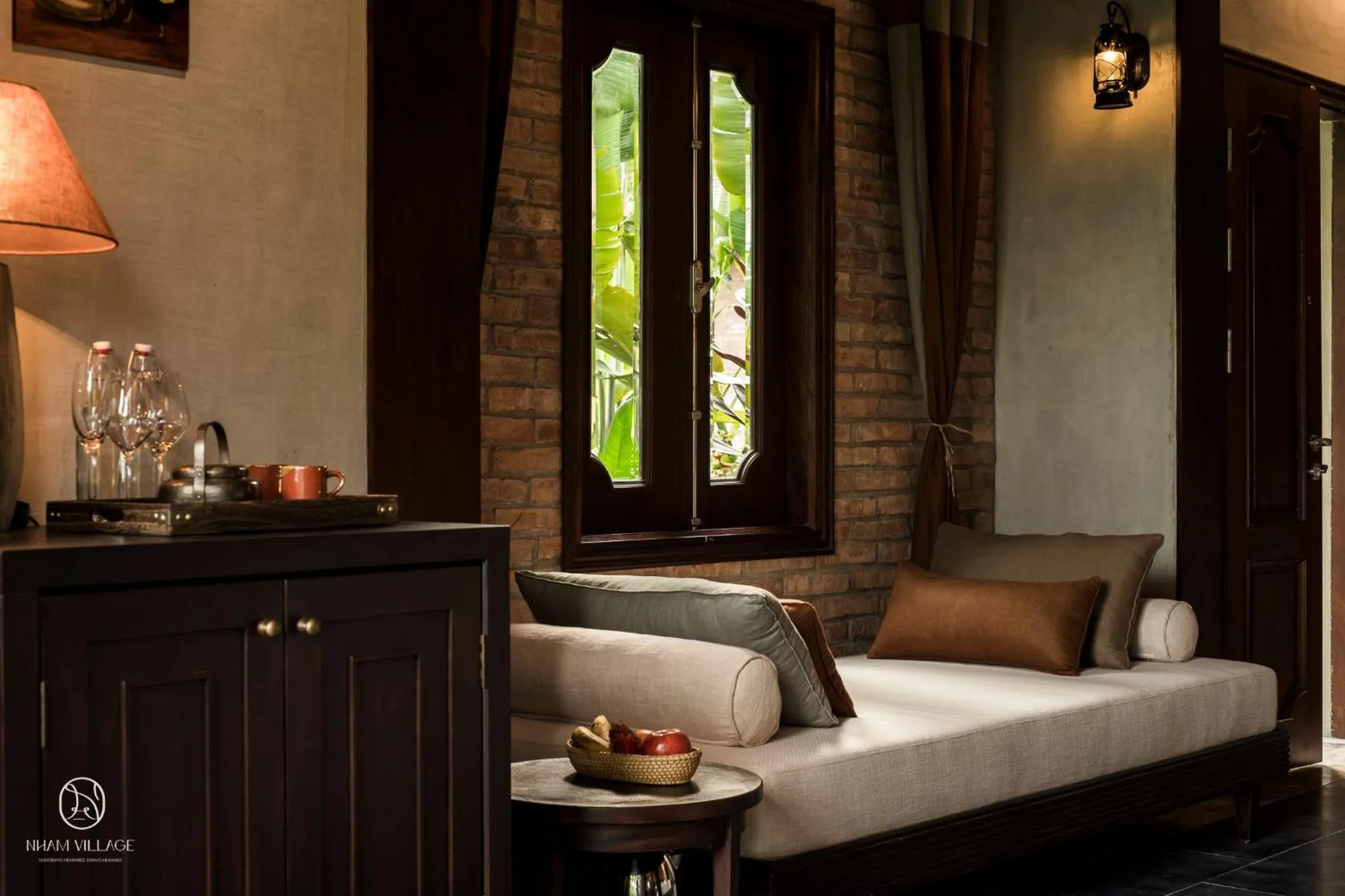 Seating area, Bed in Nham Village Resort