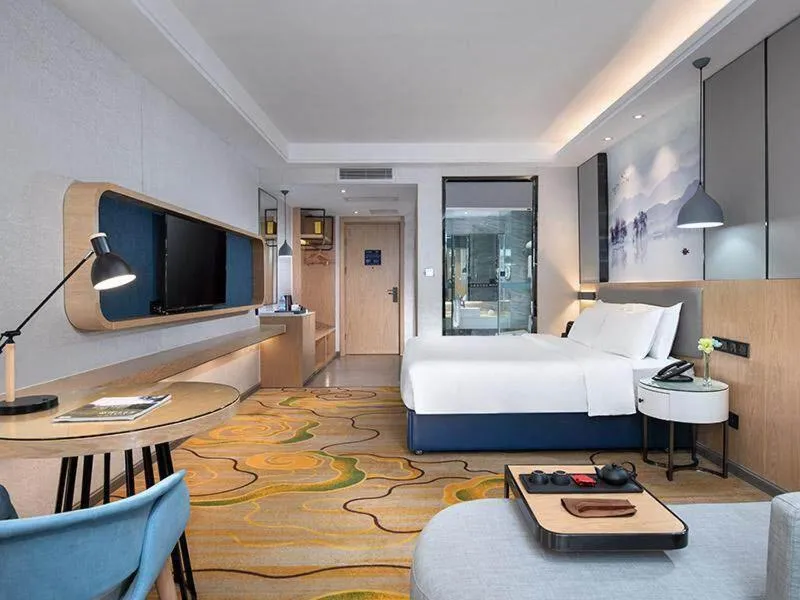 Bed in Kyriad Marvelous Hotel Shenzhen North Railway Station Yousong