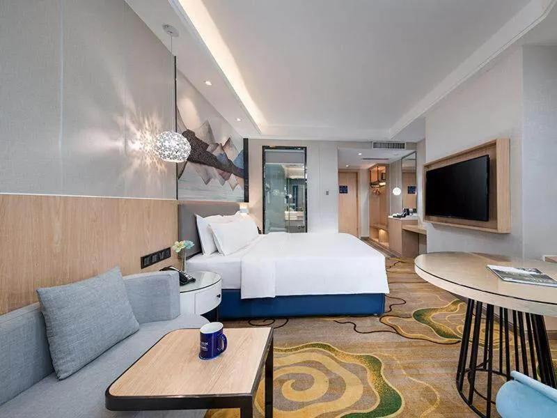 Bed in Kyriad Marvelous Hotel Shenzhen North Railway Station Yousong