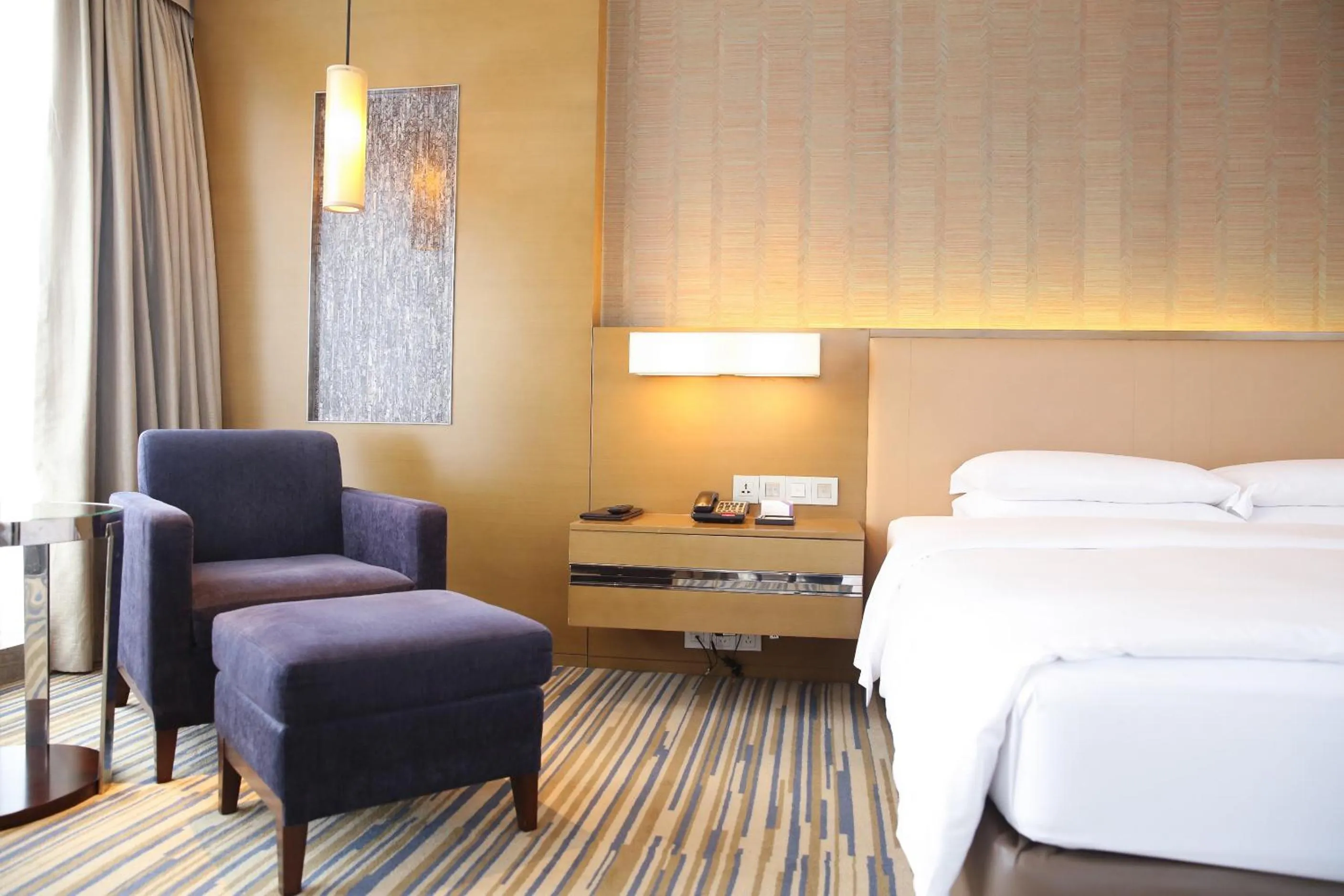 Bed in Hyatt Regency Chongqing Hotel