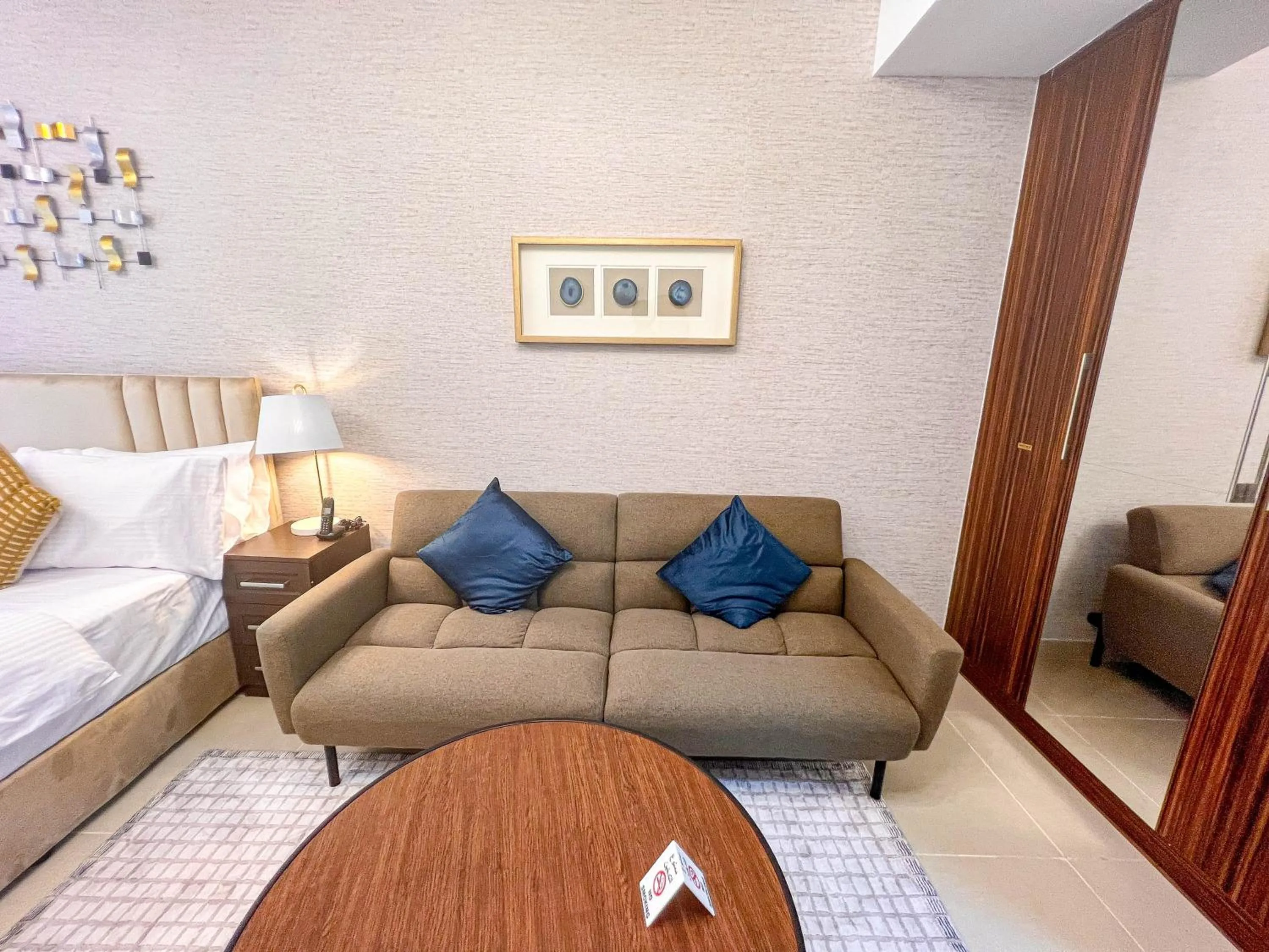 Bed in Cosmos Living Luxurious Studio Near Metro