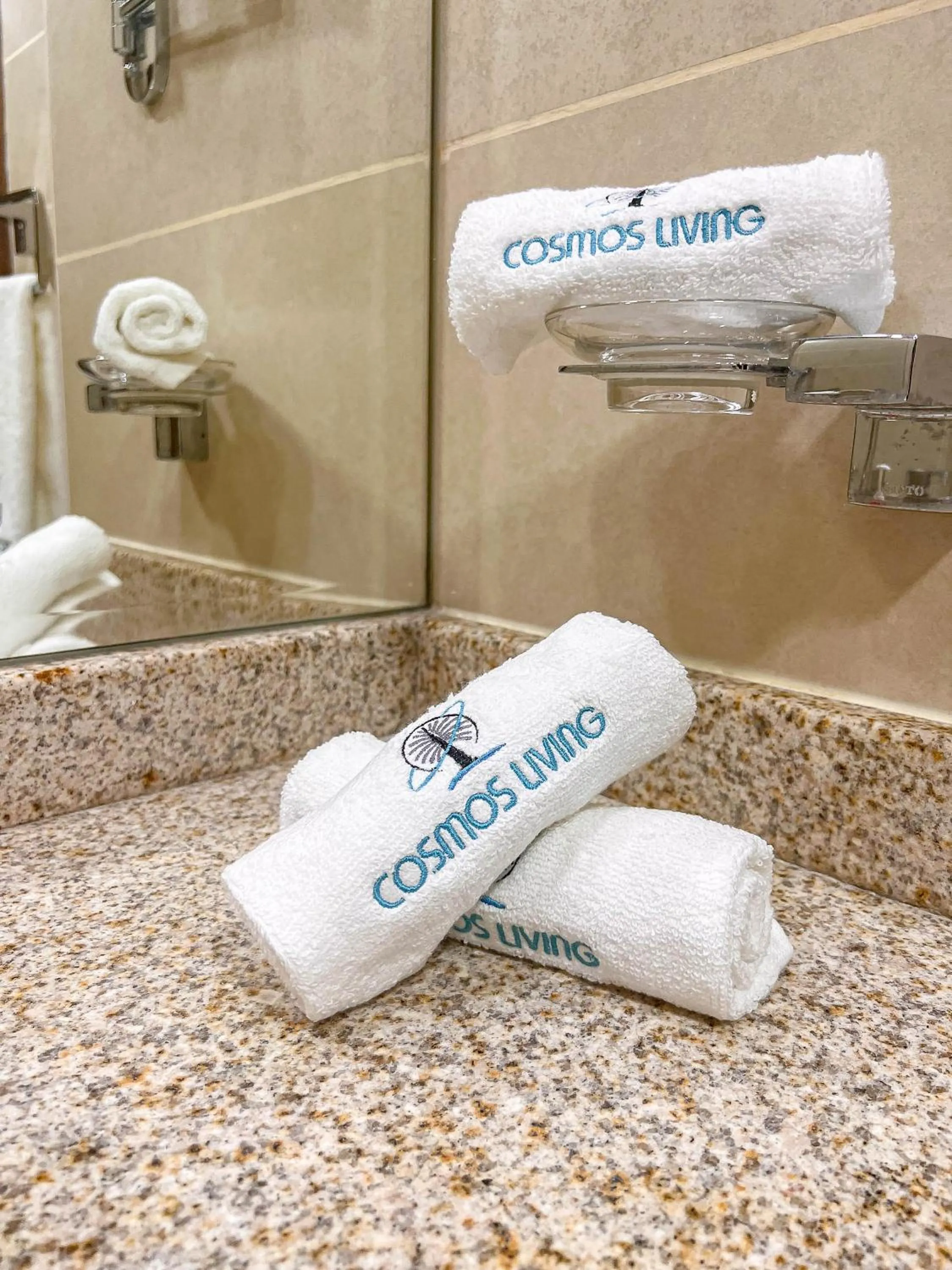 towels in Cosmos Living Luxurious Studio Near Metro