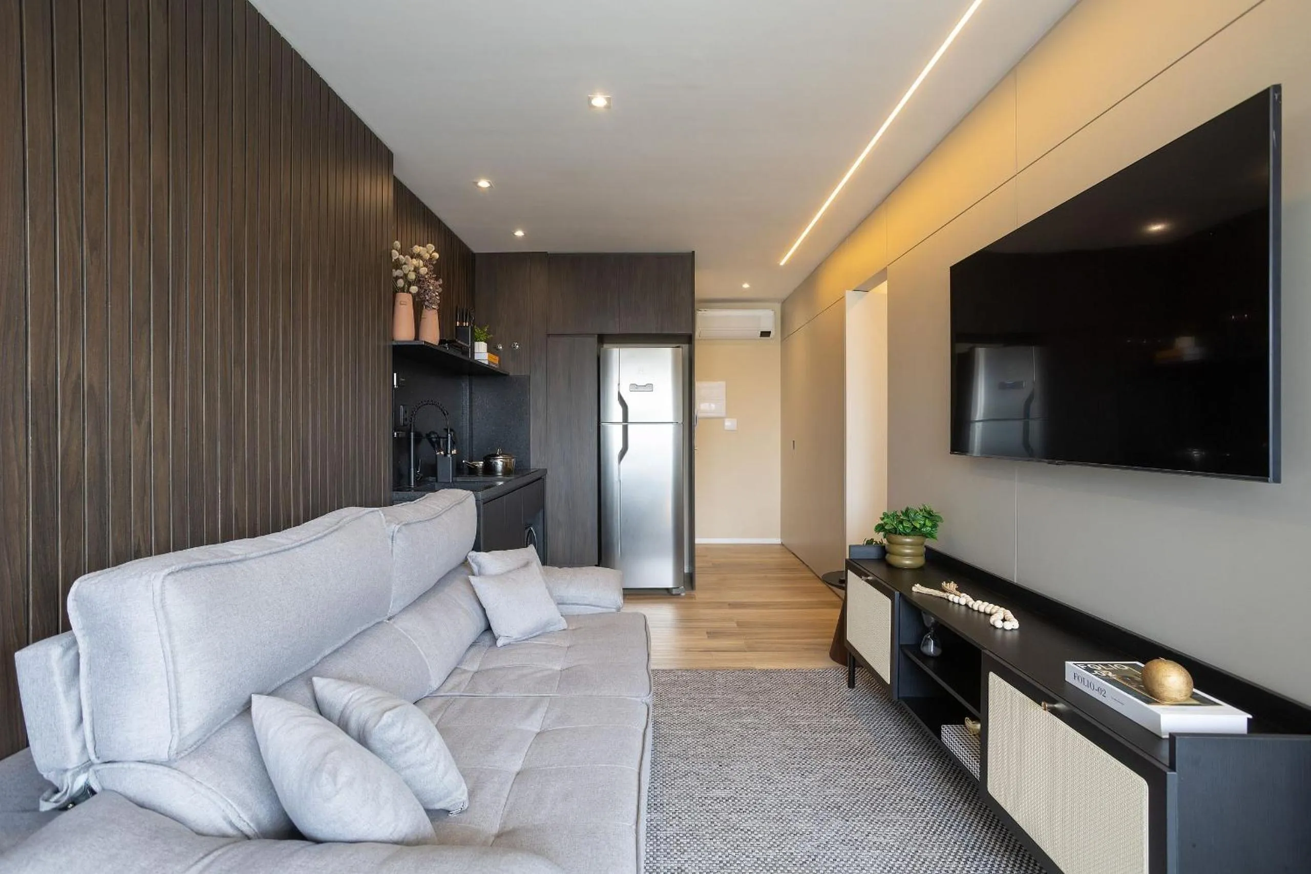 Living room in DSG Itaim by Conviva