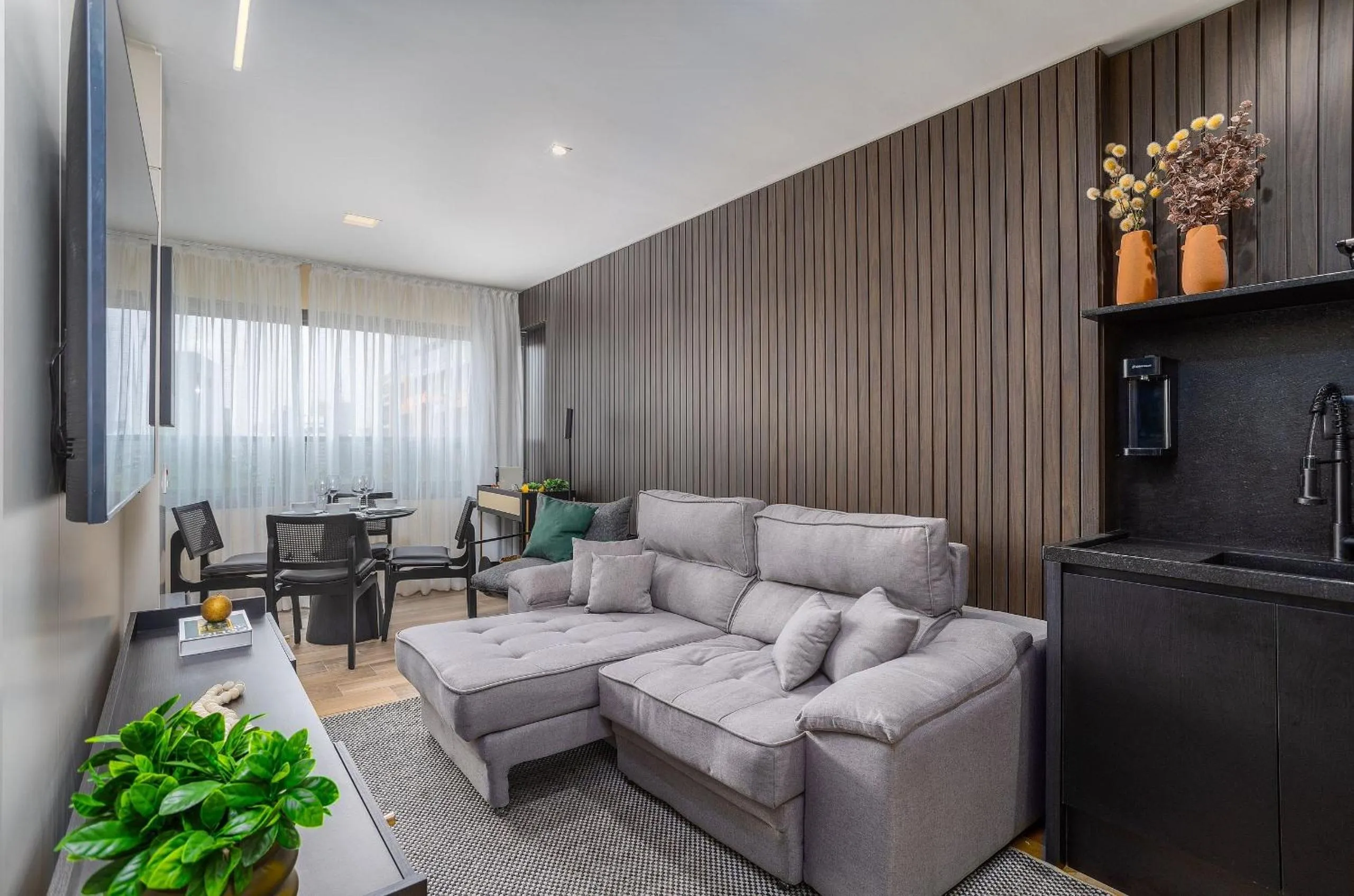 Living room in DSG Itaim by Conviva