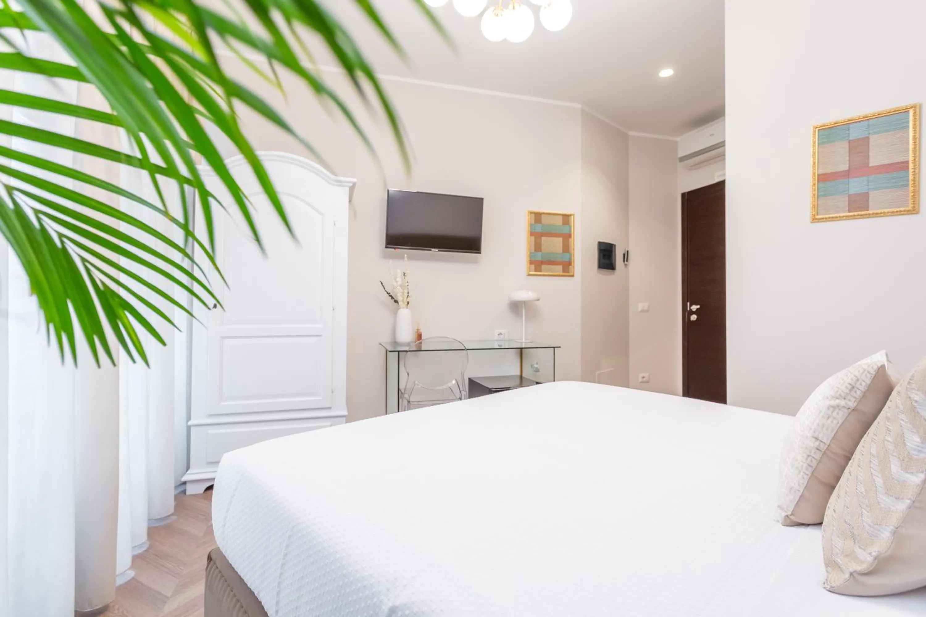 Bed in Daplace - Gran Torino Suites