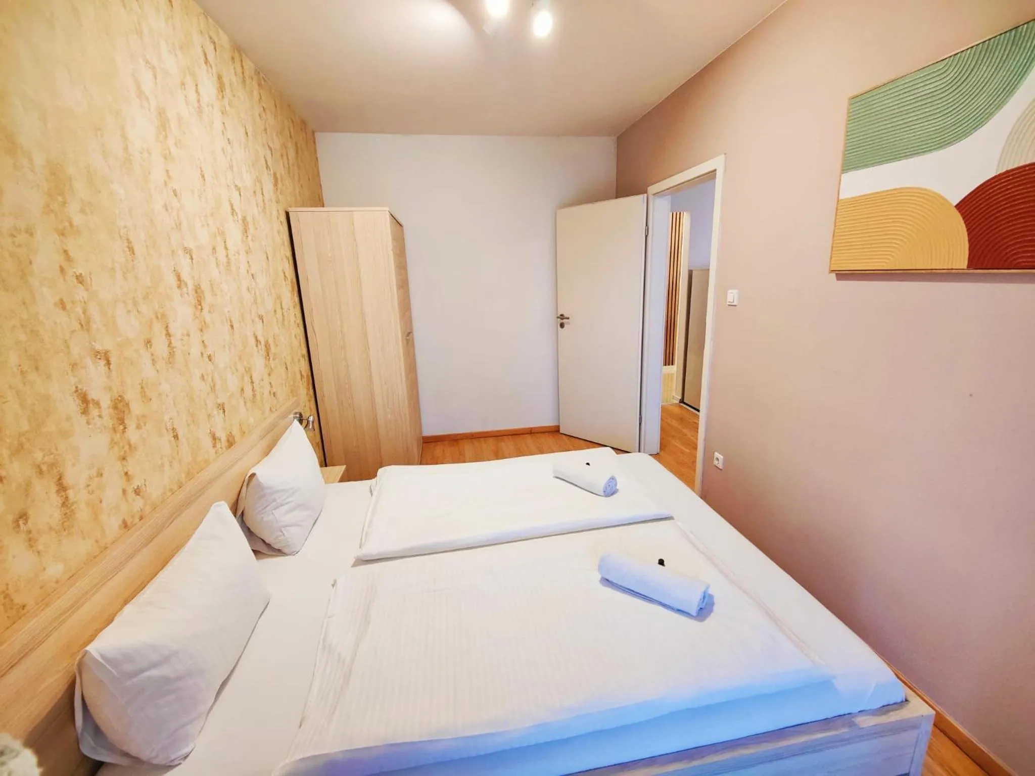 Bed in Maple Tree Budget Apartments