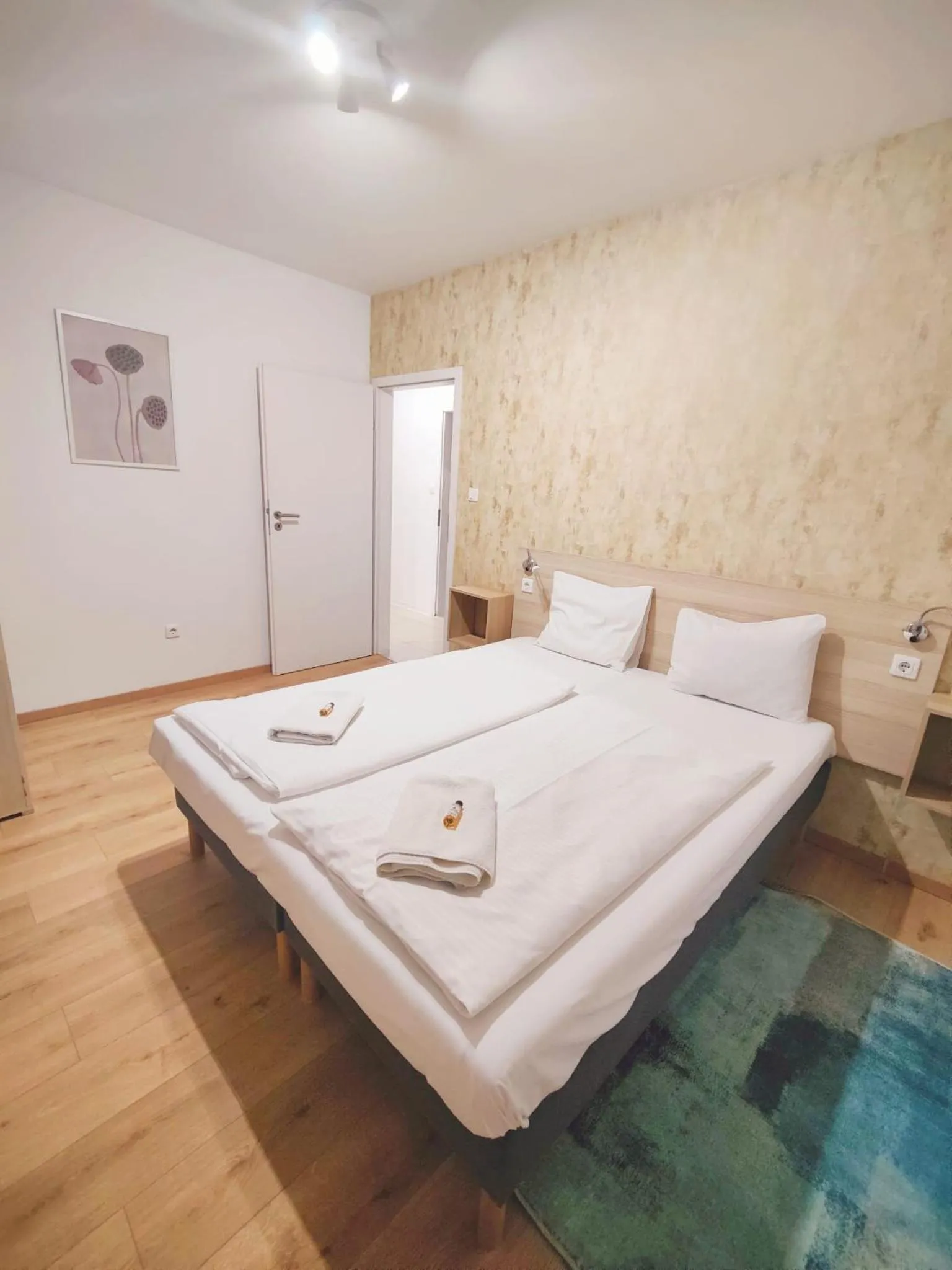 Bed in Maple Tree Budget Apartments