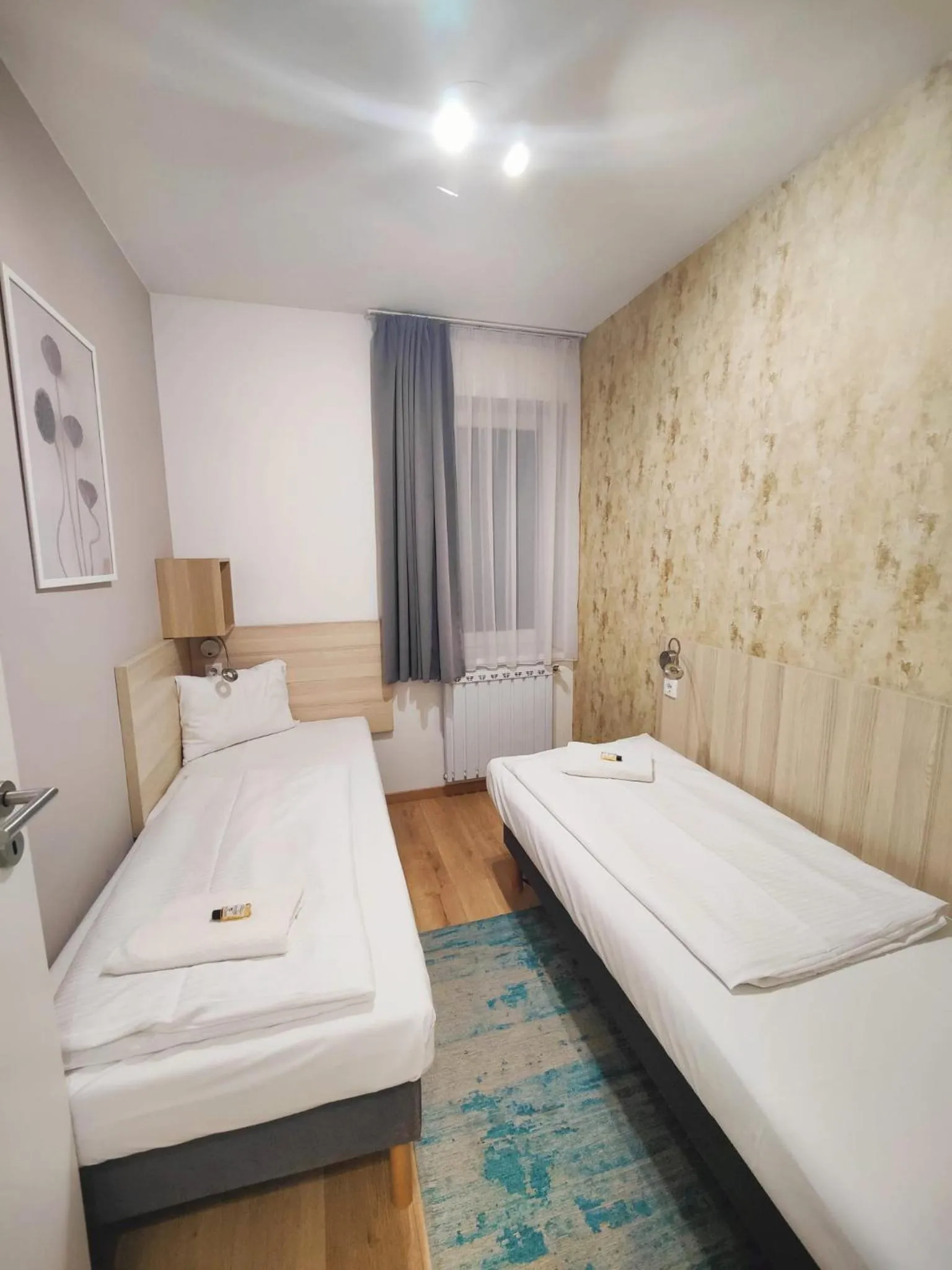 Bed in Maple Tree Budget Apartments