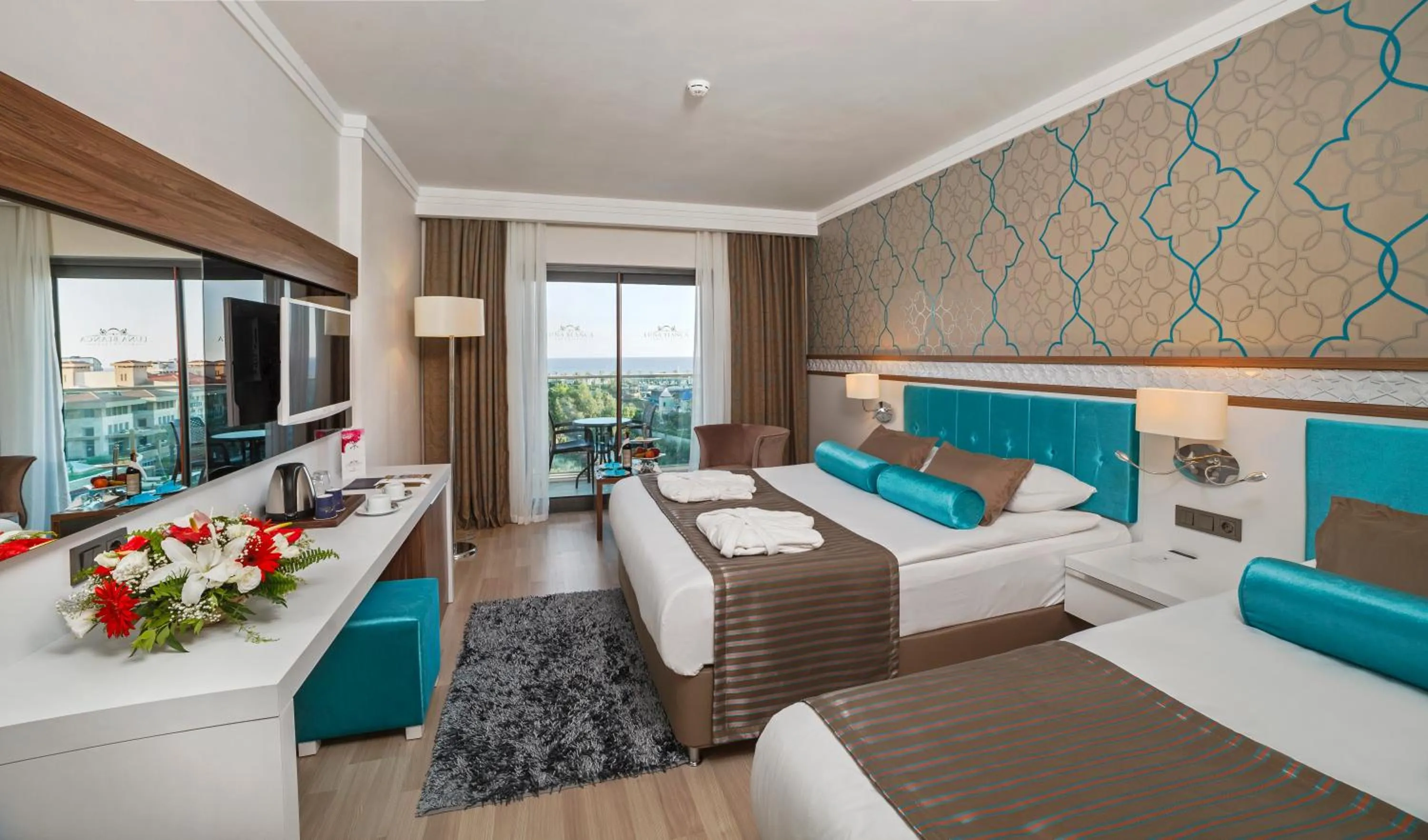 Bed in Luna Blanca Resort & Spa