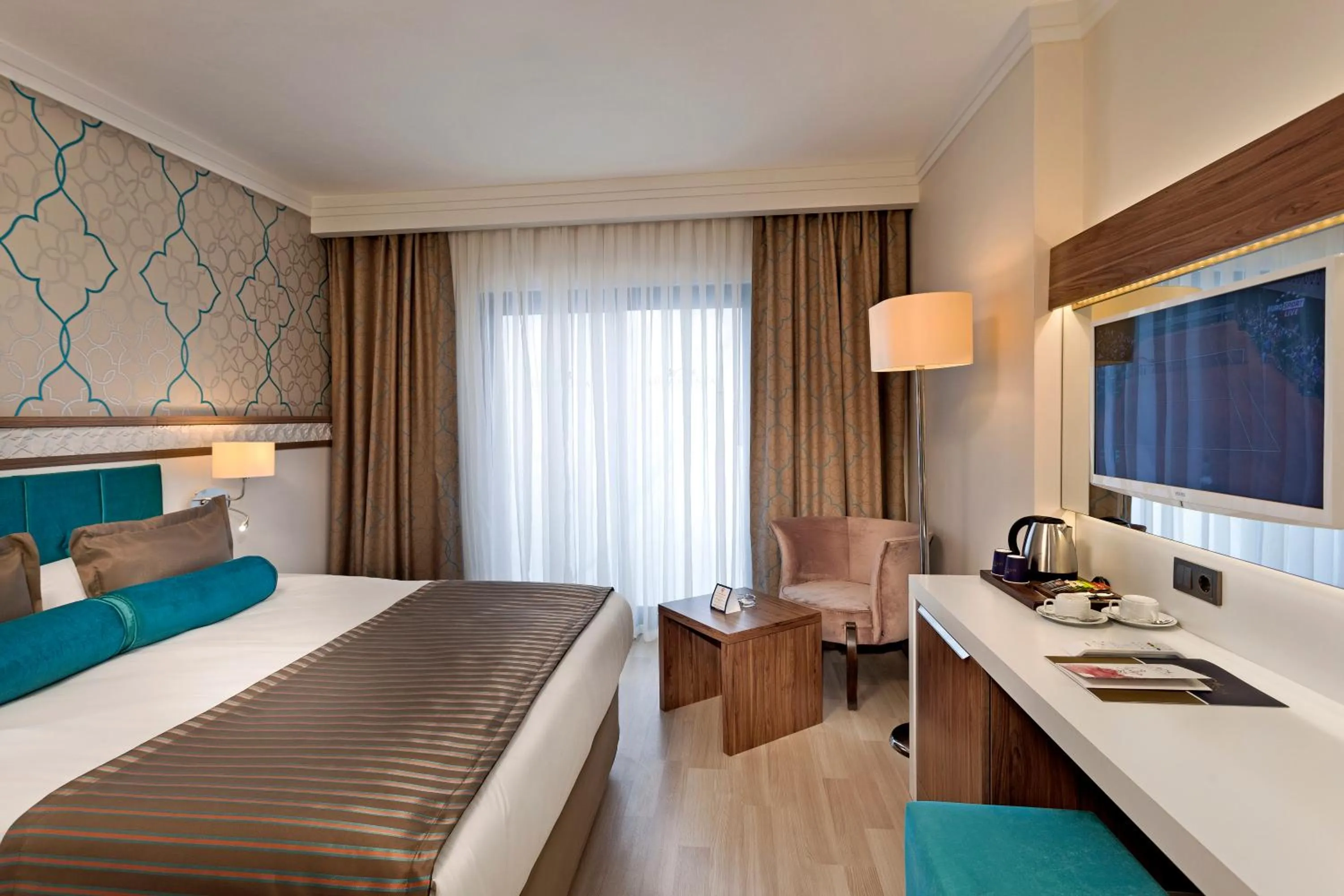 Bed in Luna Blanca Resort & Spa