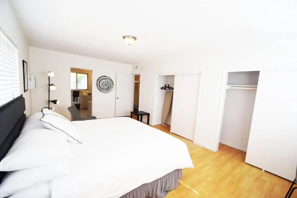 Bed in Hollywood Business Apartments