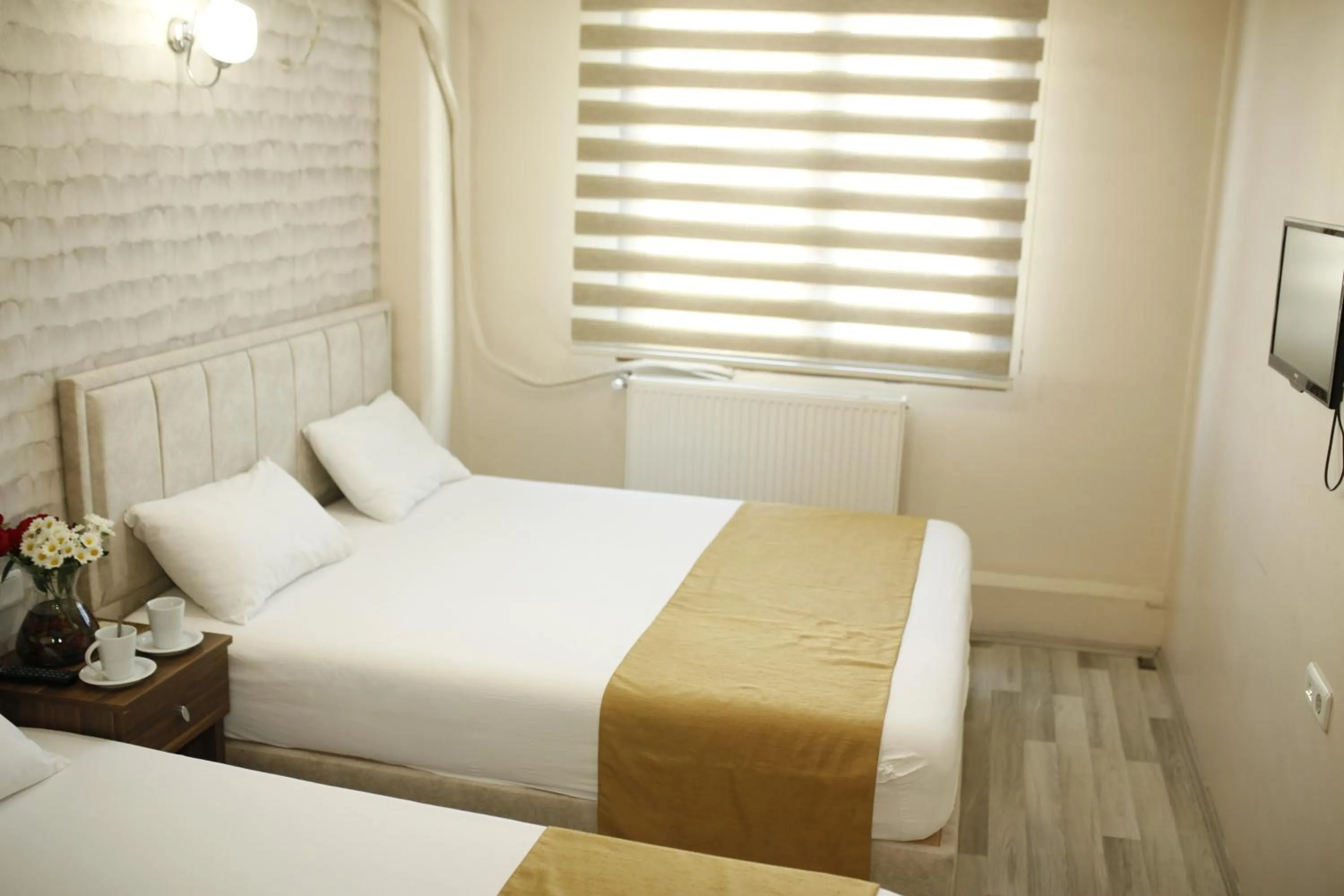 Bed in Birlik Apart Hotel