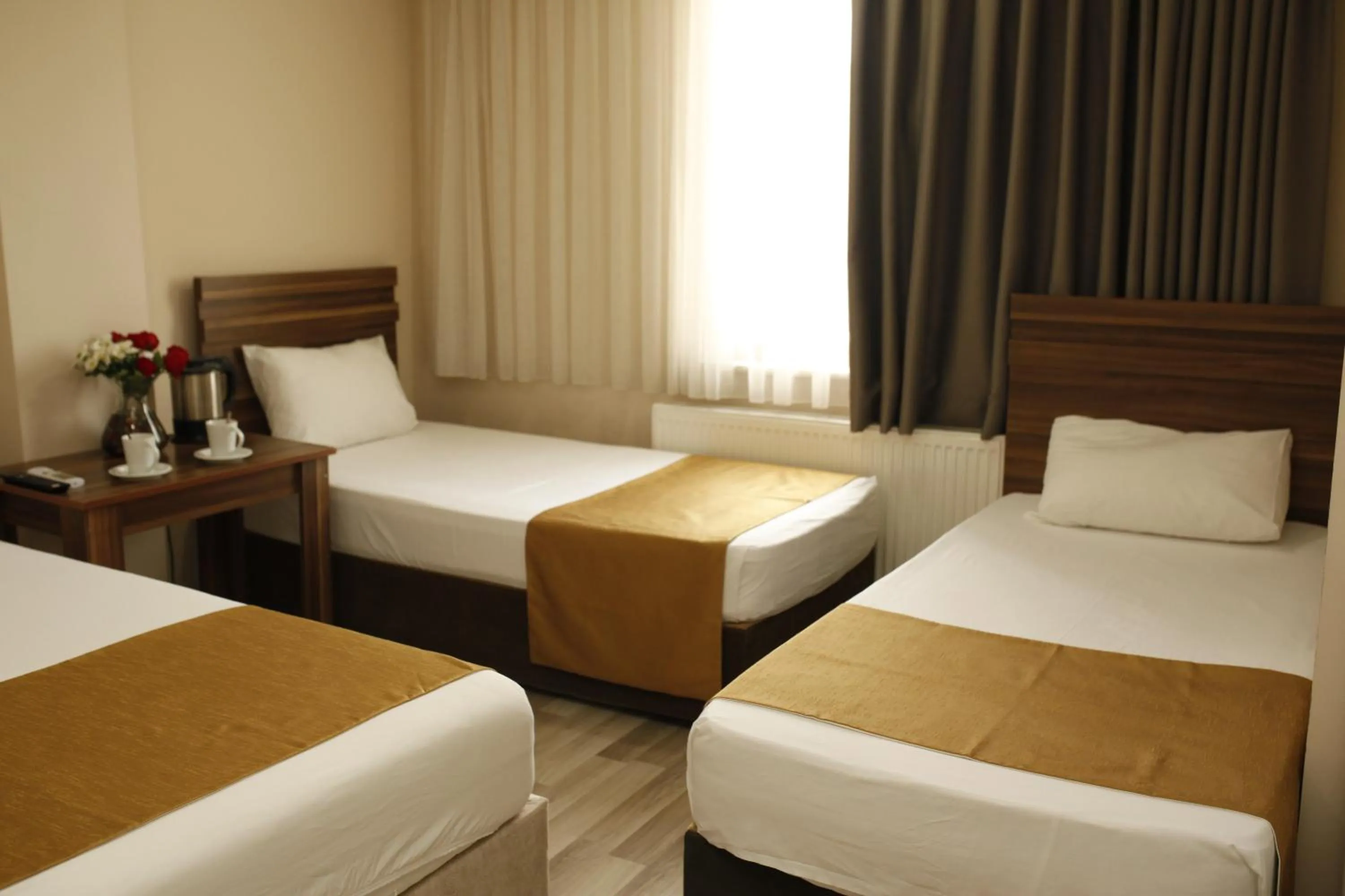 Bed in Birlik Apart Hotel