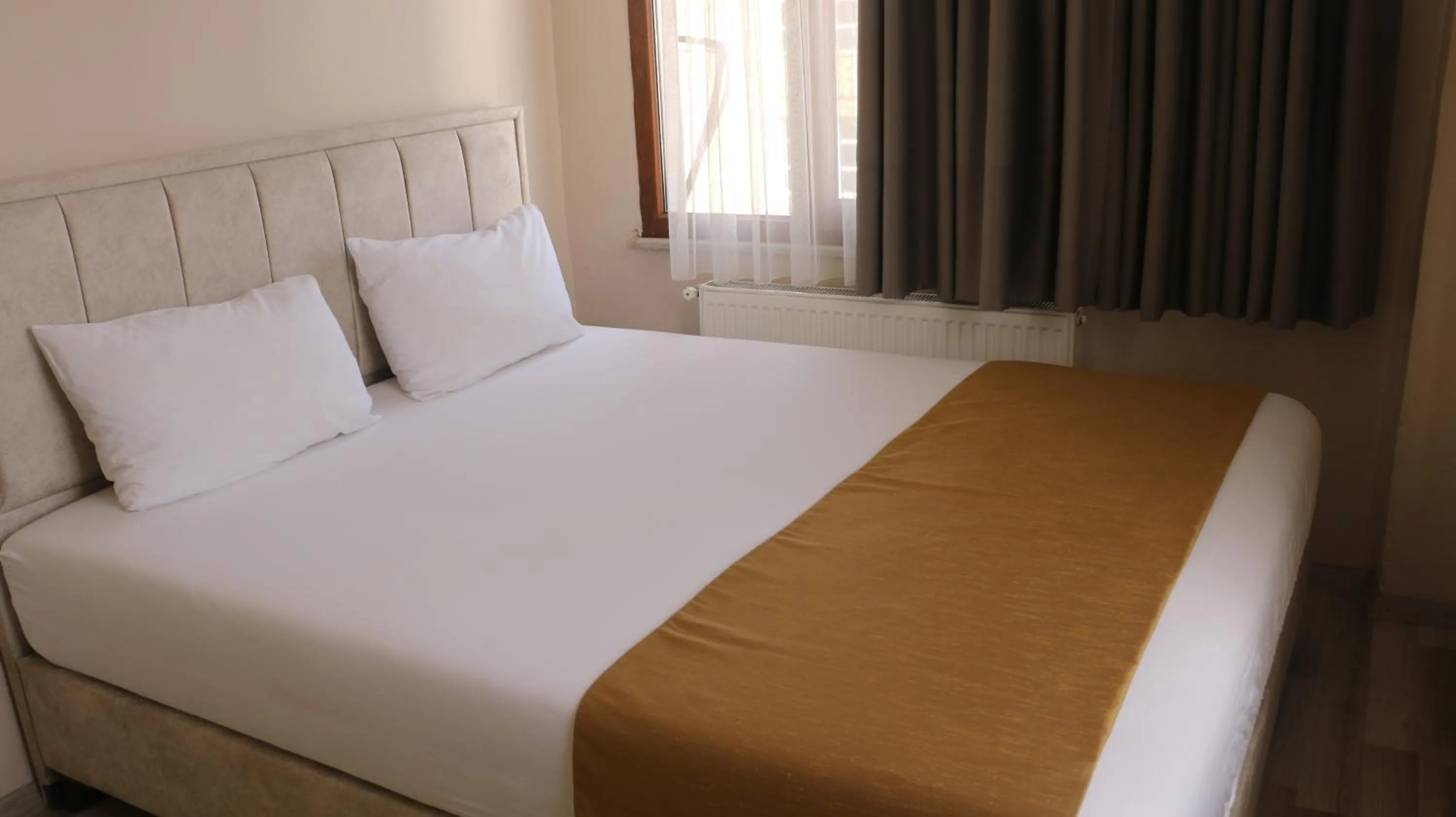 Bed in Birlik Apart Hotel