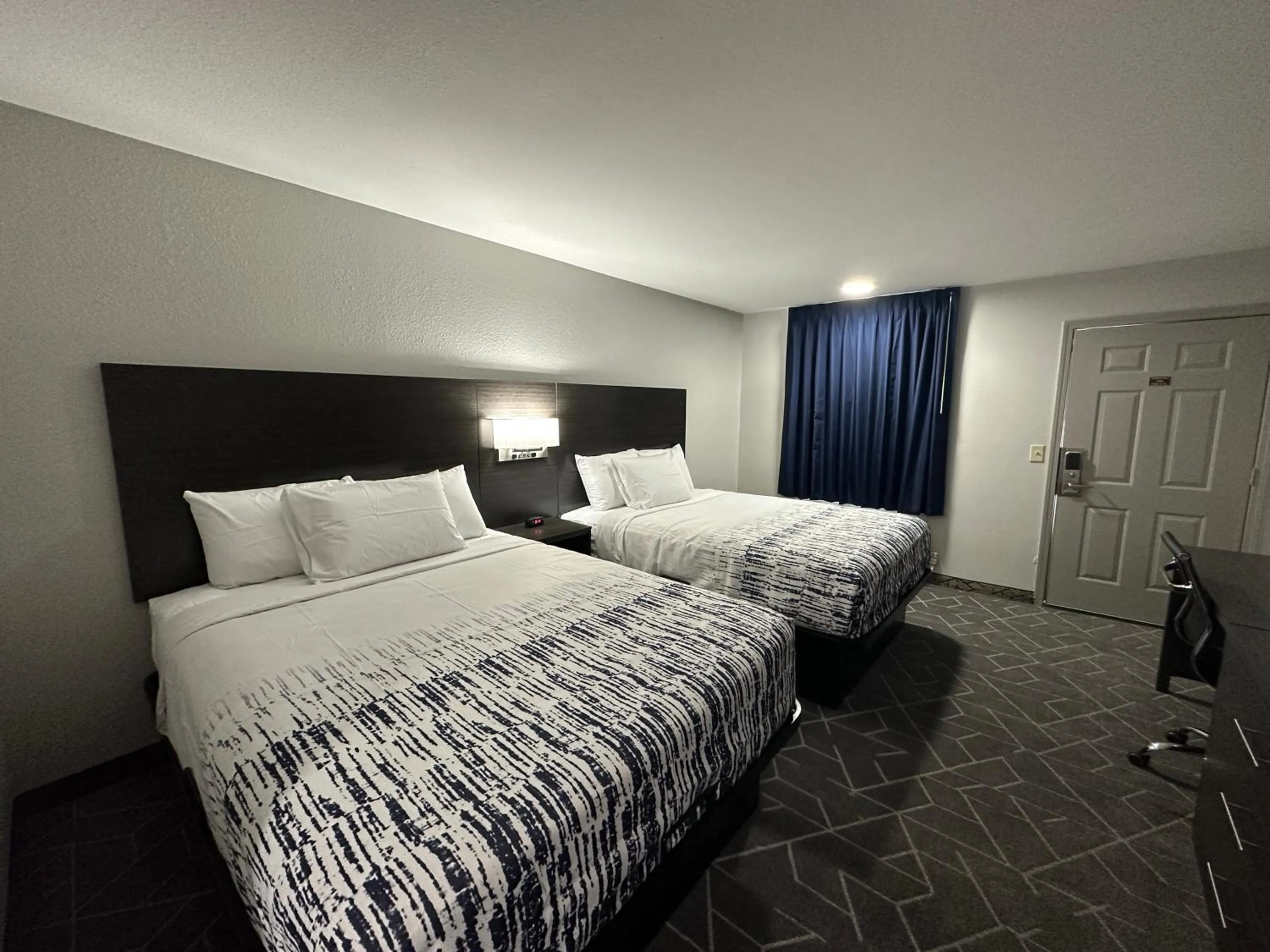 Bed in Budget Inn Muskogee