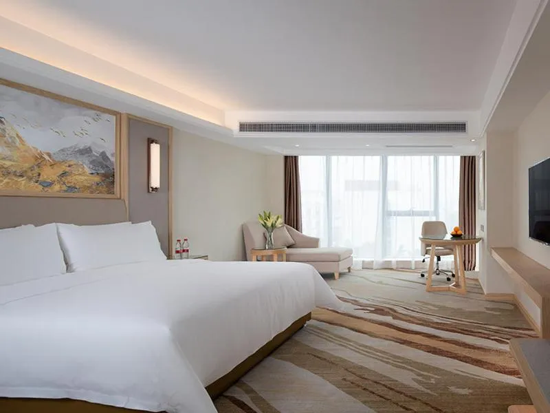Bed in Vienna International Hotel South Gate of Shenzhen International Convention and Exhibition Center