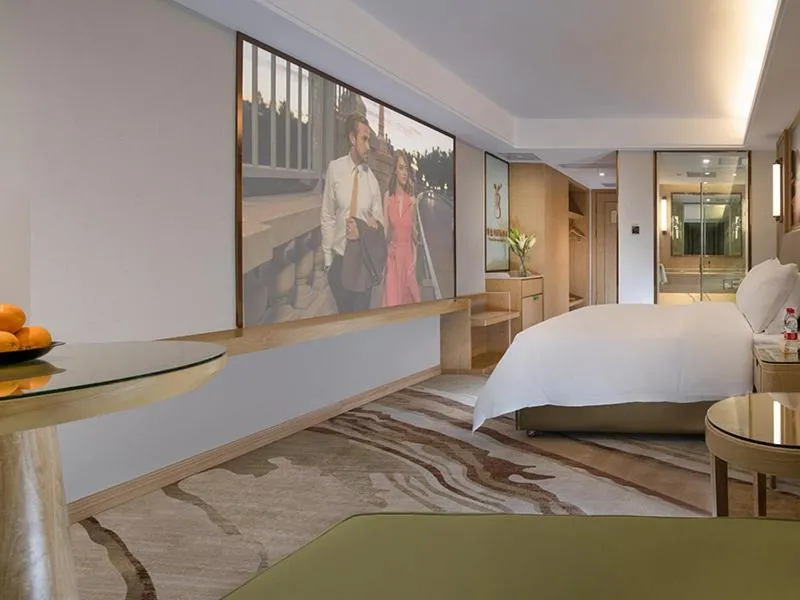 Bed in Vienna International Hotel South Gate of Shenzhen International Convention and Exhibition Center