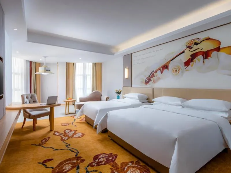 Bed in Vienna International Hotel Fujian Quanzhou Jinjiang Airport