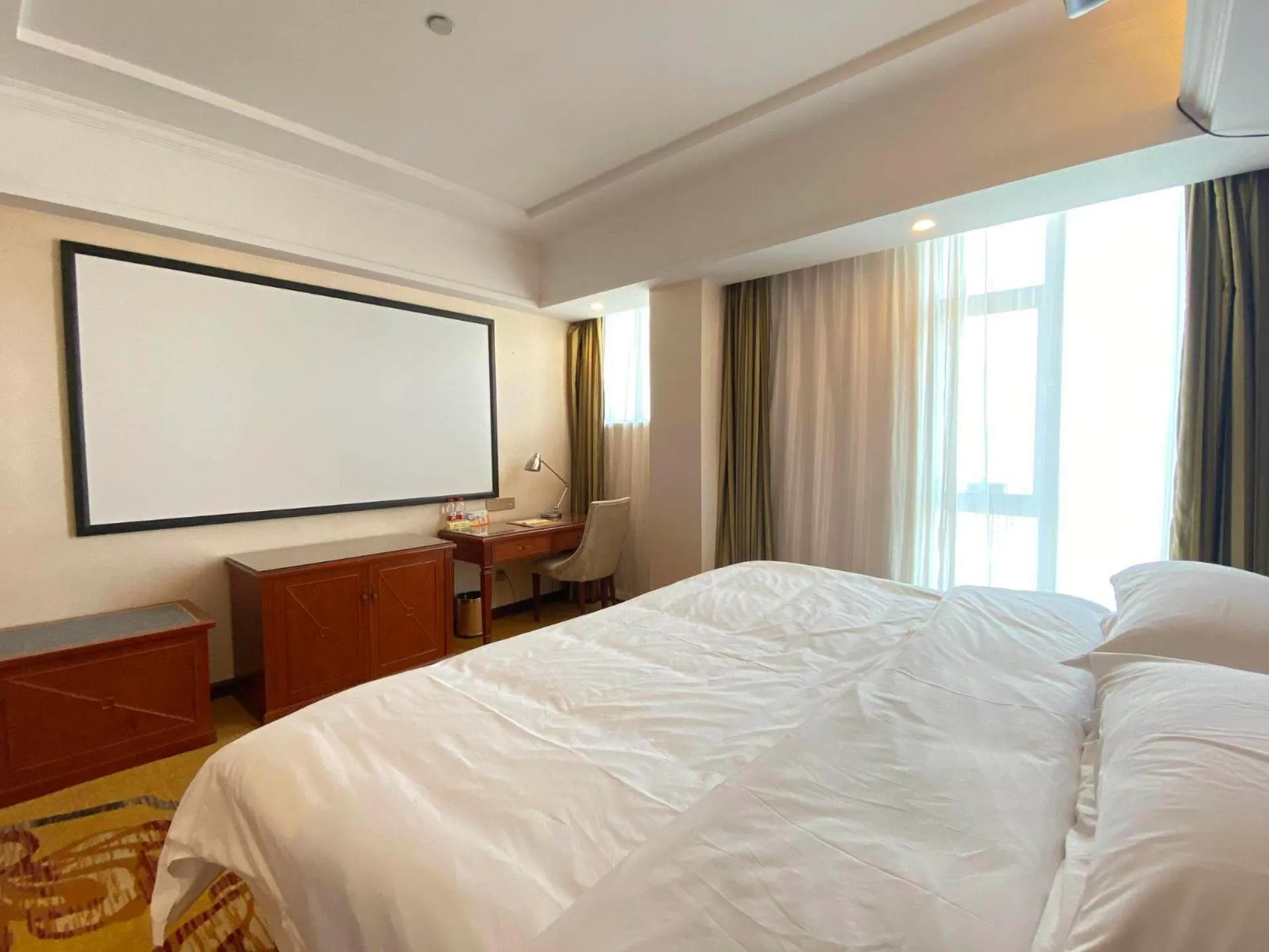 Bed in Vienna Hotel Jieyang Rongjiangxincheng Store