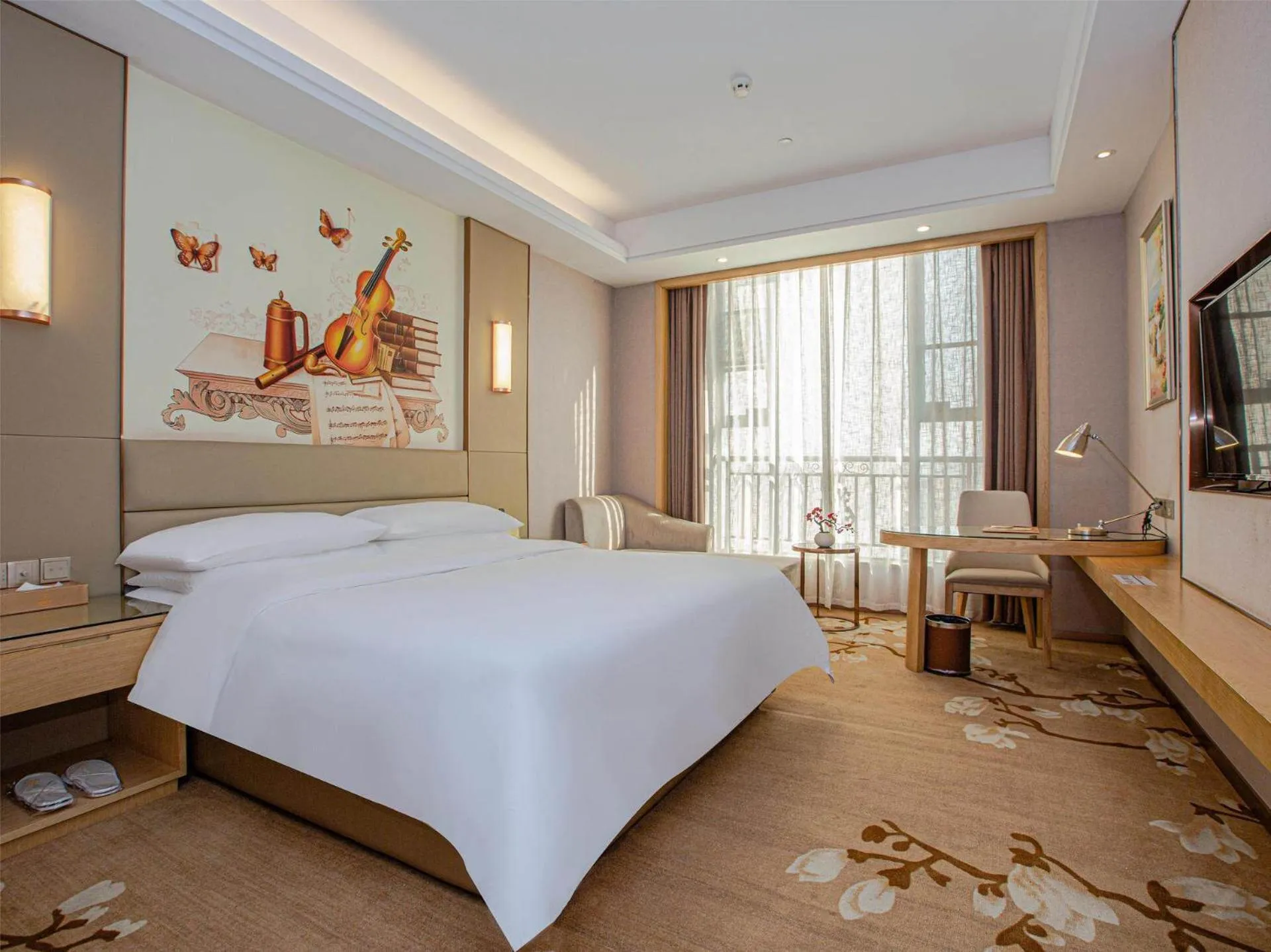 Bed in Vienna International Hotel Nanchang Qingshan Lake Wanda Plaza