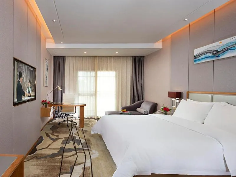 Bed in Vienna International Hotel Ganzhou Longnan