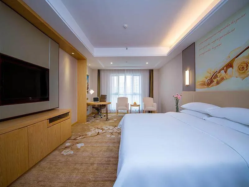Bed in Vienna International Hotel Yichang Gezhouba Sanxia Culture Tiandi