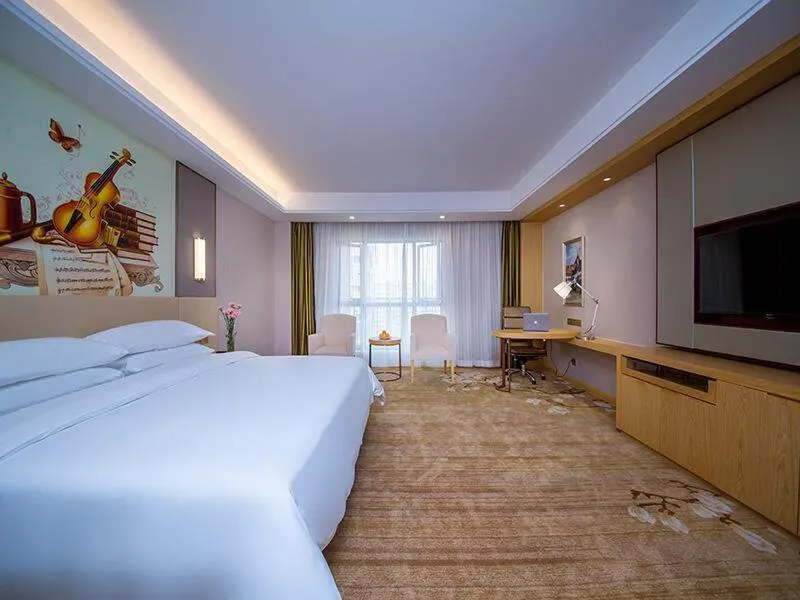 Bed in Vienna International Hotel Yichang Gezhouba Sanxia Culture Tiandi