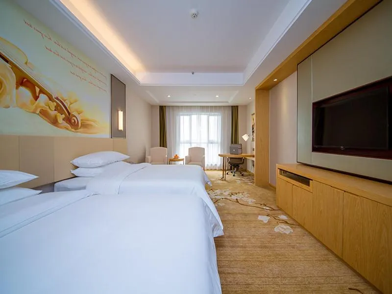 Bed in Vienna International Hotel Yichang Gezhouba Sanxia Culture Tiandi