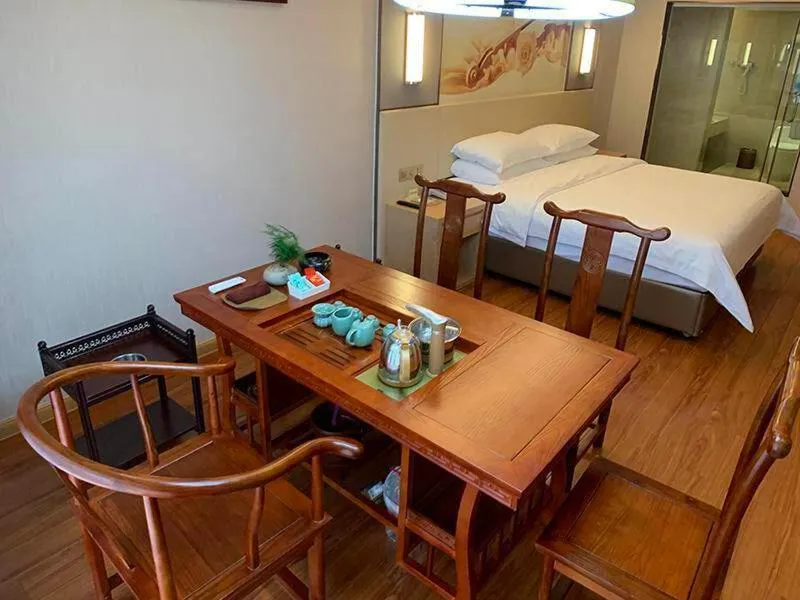 Bed in Vienna International Hotel Yichang Gezhouba Sanxia Culture Tiandi