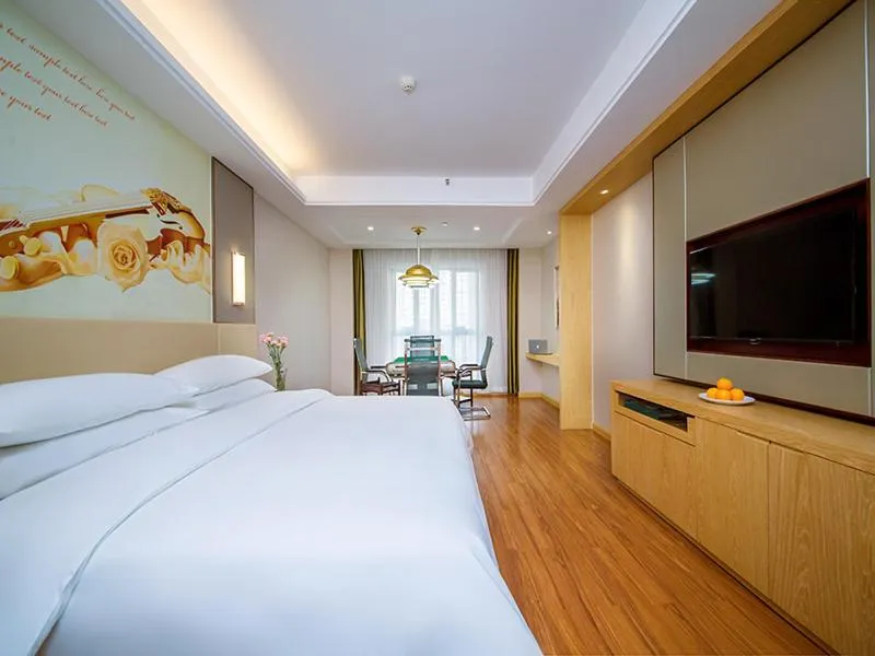 Bed in Vienna International Hotel Yichang Gezhouba Sanxia Culture Tiandi